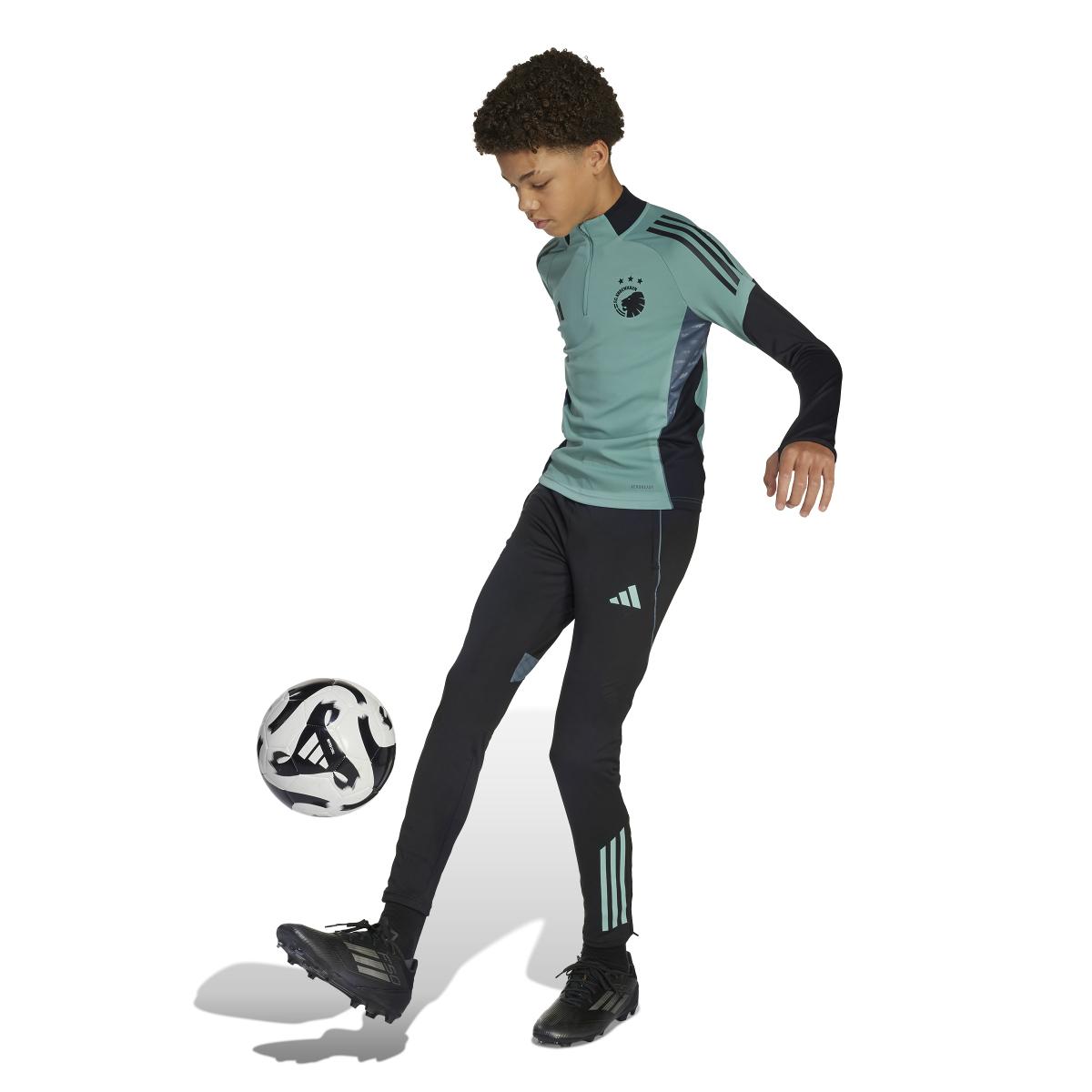 product/2/0/2025_adidas_jl6321_4_apparel_on_model_walking_view_white.jpg