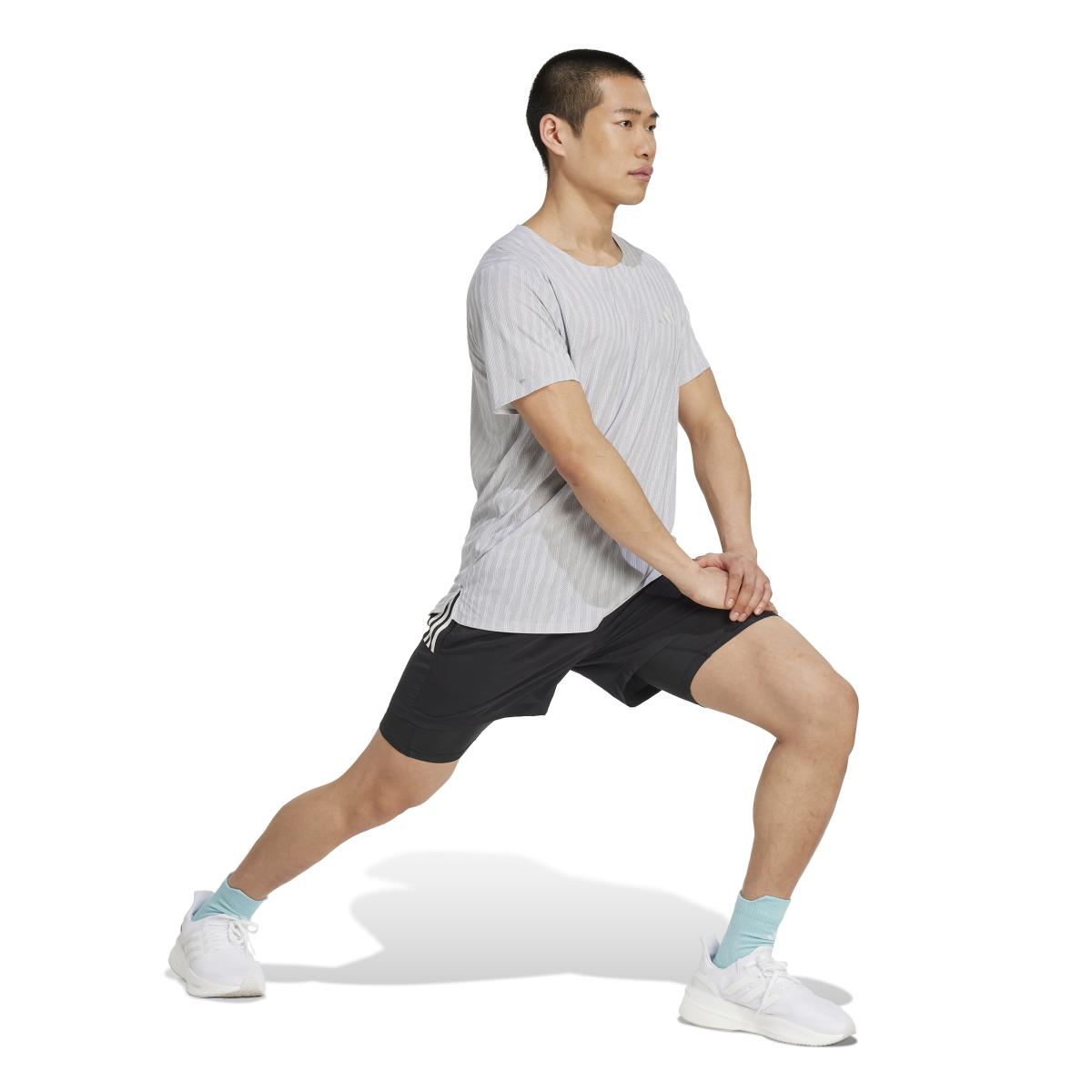 product/2/0/2025_adidas_jm5701_4_apparel_on_model_walking_view_white.jpg