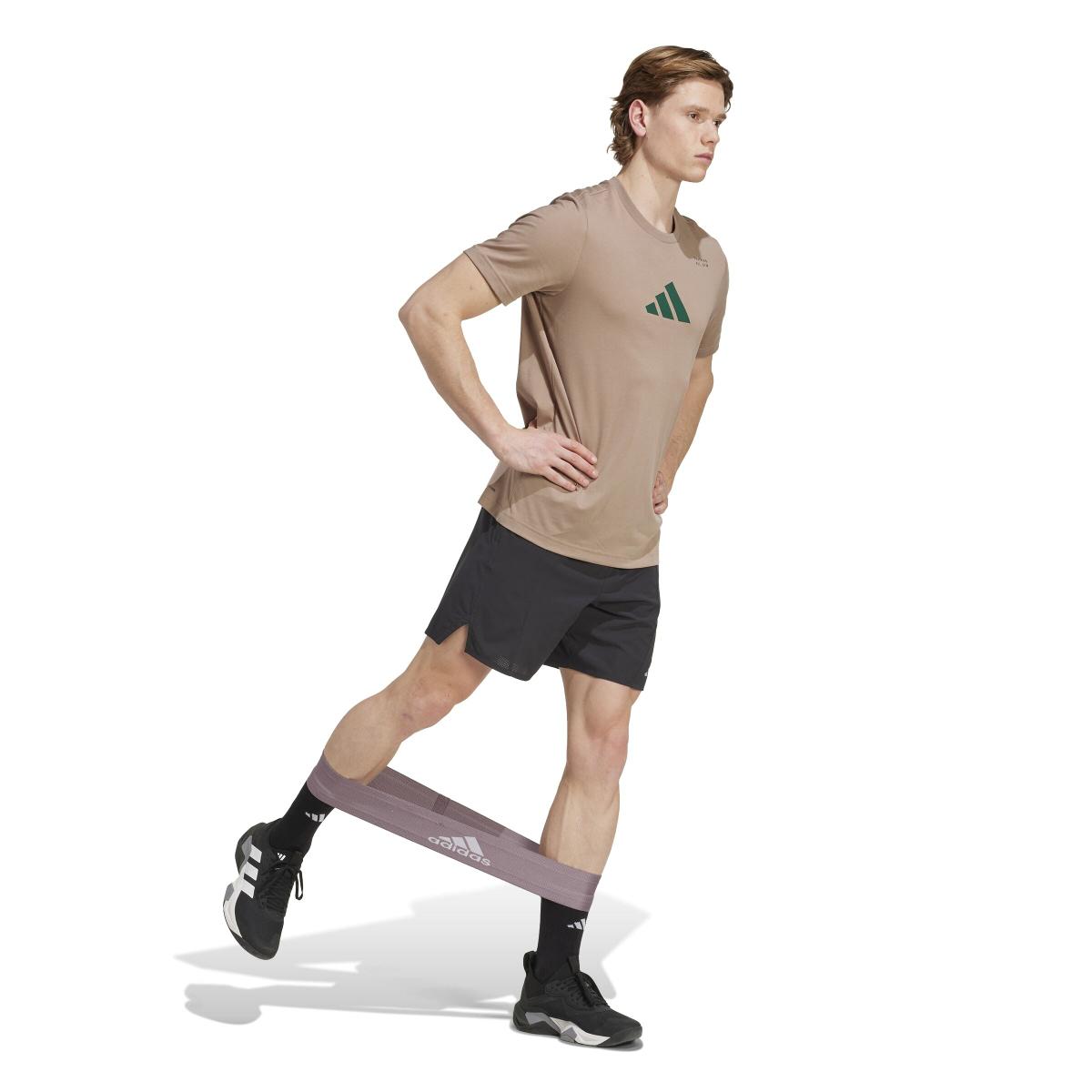 product/2/0/2025_adidas_jm8977_4_apparel_on_model_walking_view_white.jpg