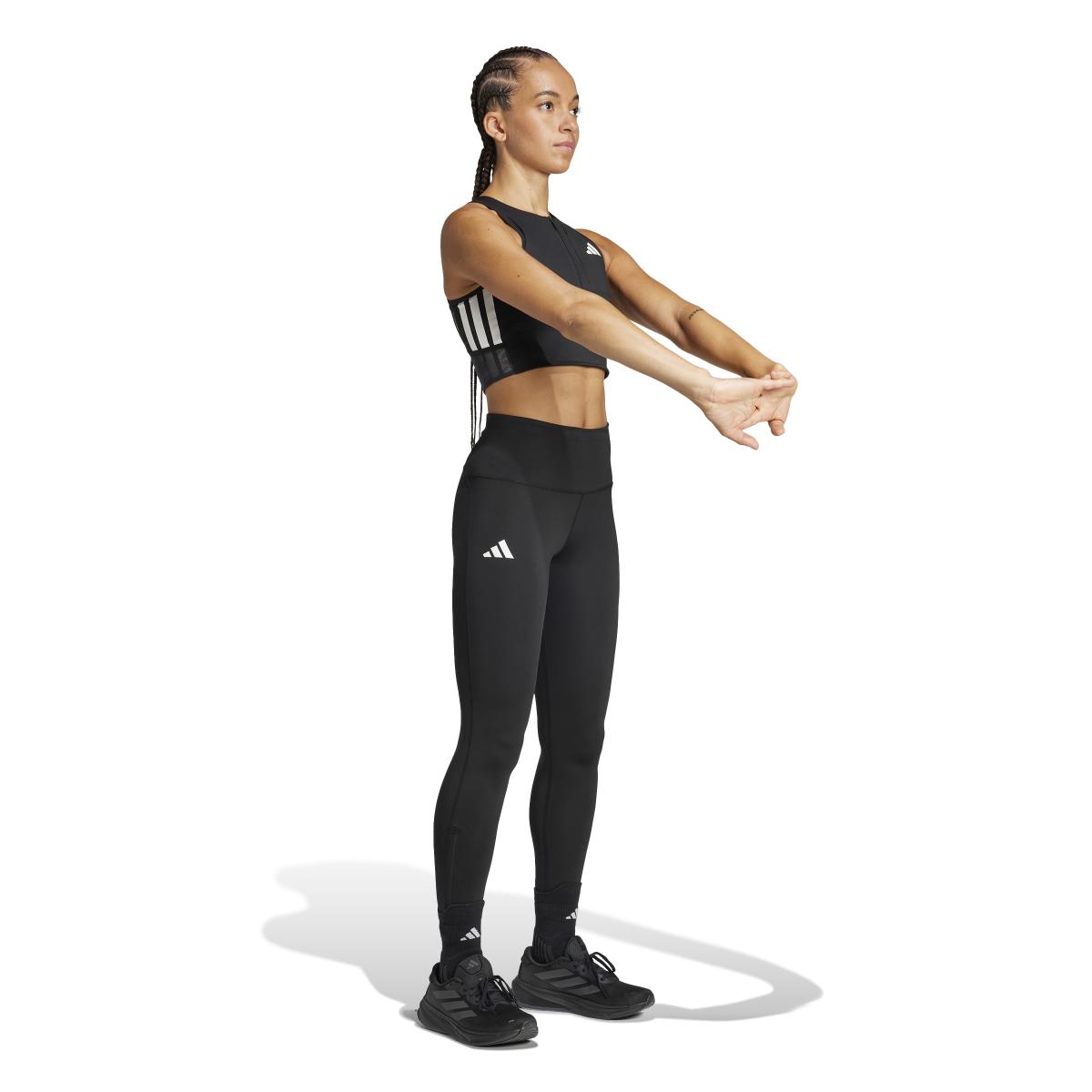 product/2/0/2025_adidas_jn7162_4_apparel_on_model_walking_view_white.jpg