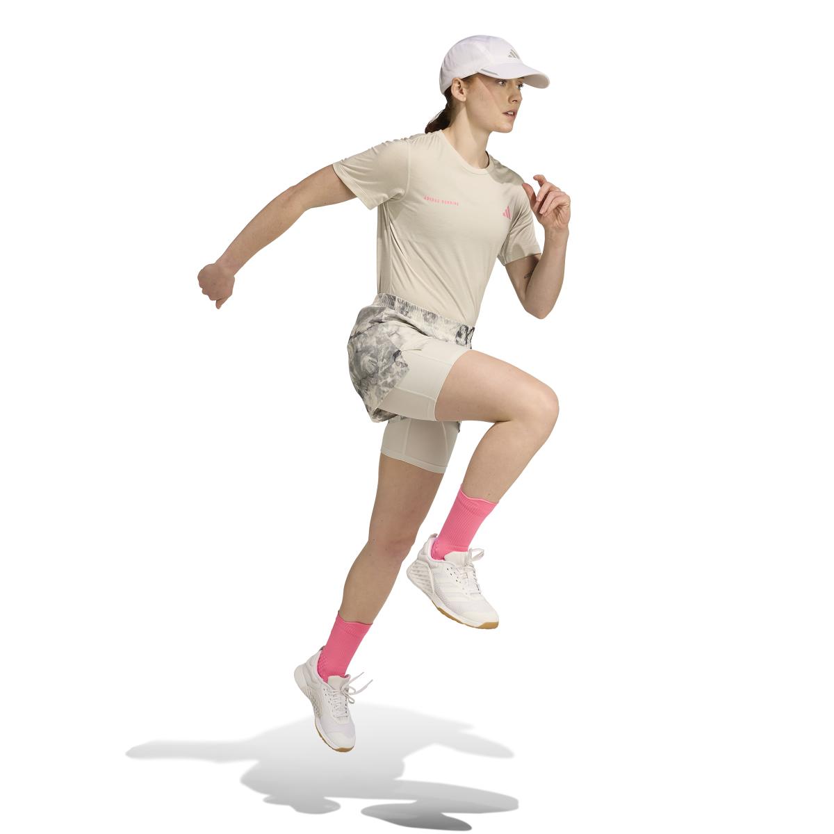 product/2/0/2025_adidas_jn9669_4_apparel_on_model_walking_view_white.jpg