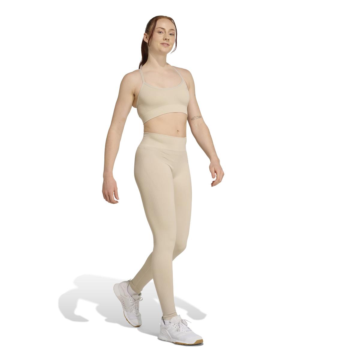 product/2/0/2025_adidas_jx3918_4_apparel_on_model_walking_view_white.jpg