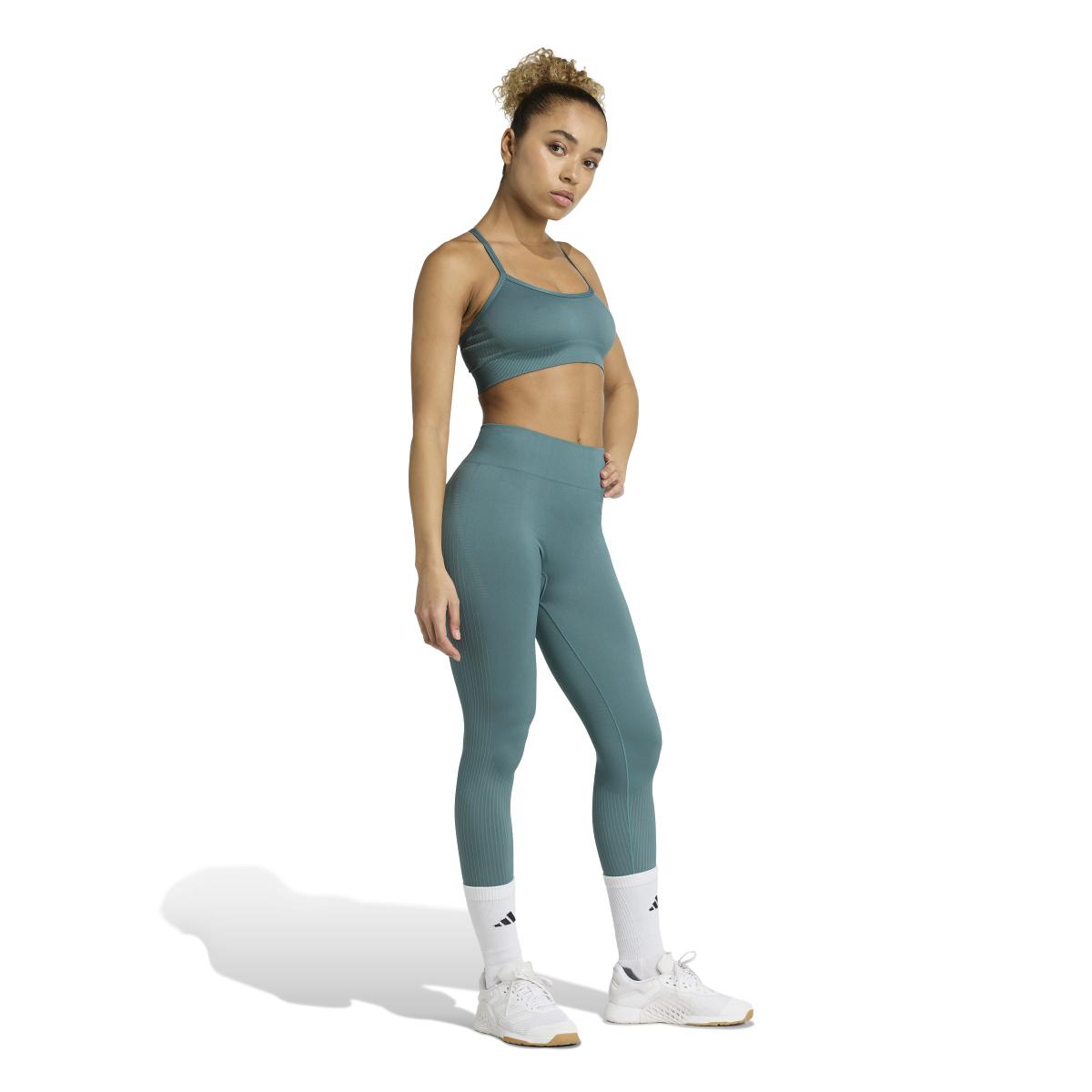 product/2/0/2025_adidas_jx3920_4_apparel_on_model_walking_view_white.jpg