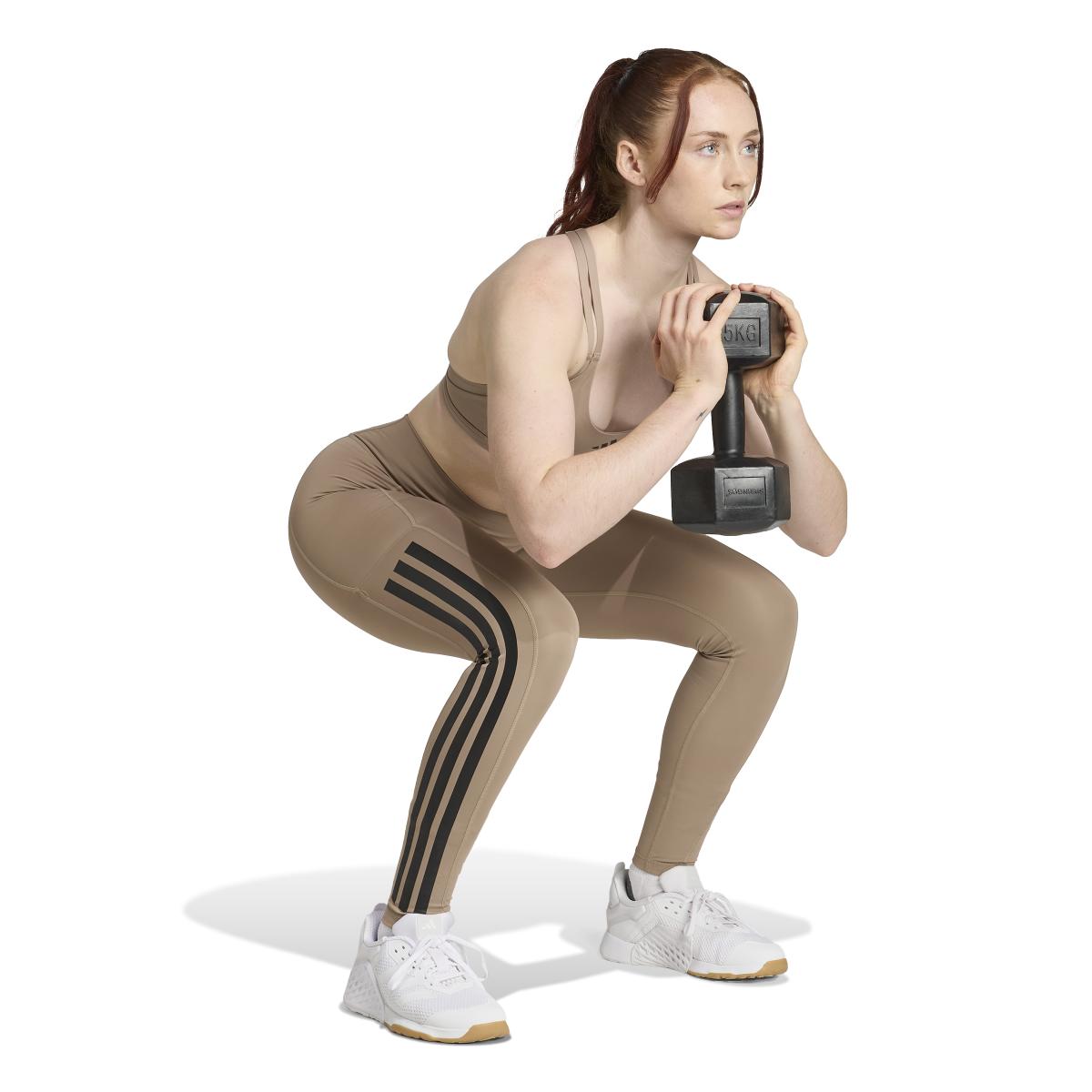 product/2/0/2025_adidas_jx7319_4_apparel_on_model_walking_view_white.jpg