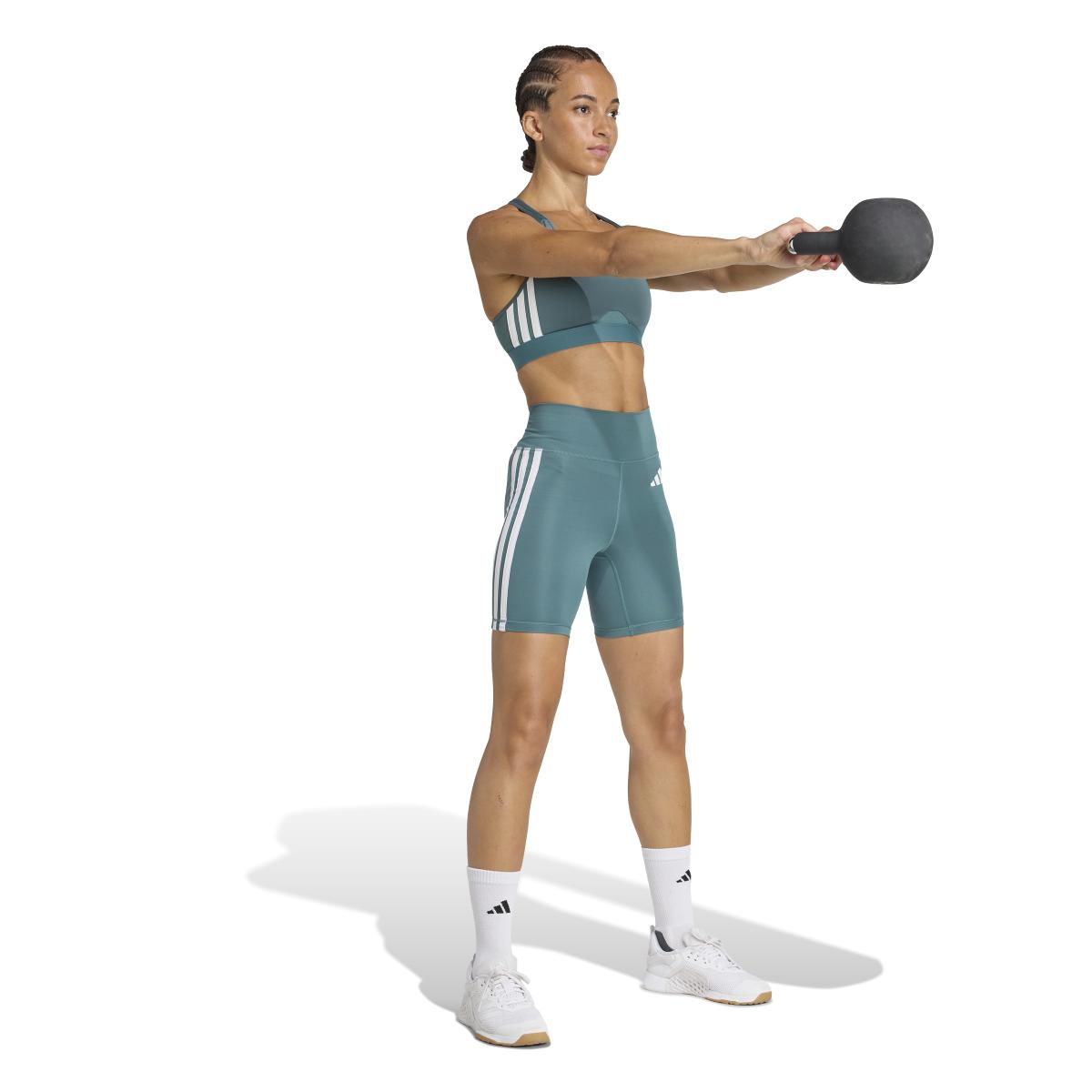 product/2/0/2025_adidas_kb7364_5_apparel_on_model_walking_view_white.jpg