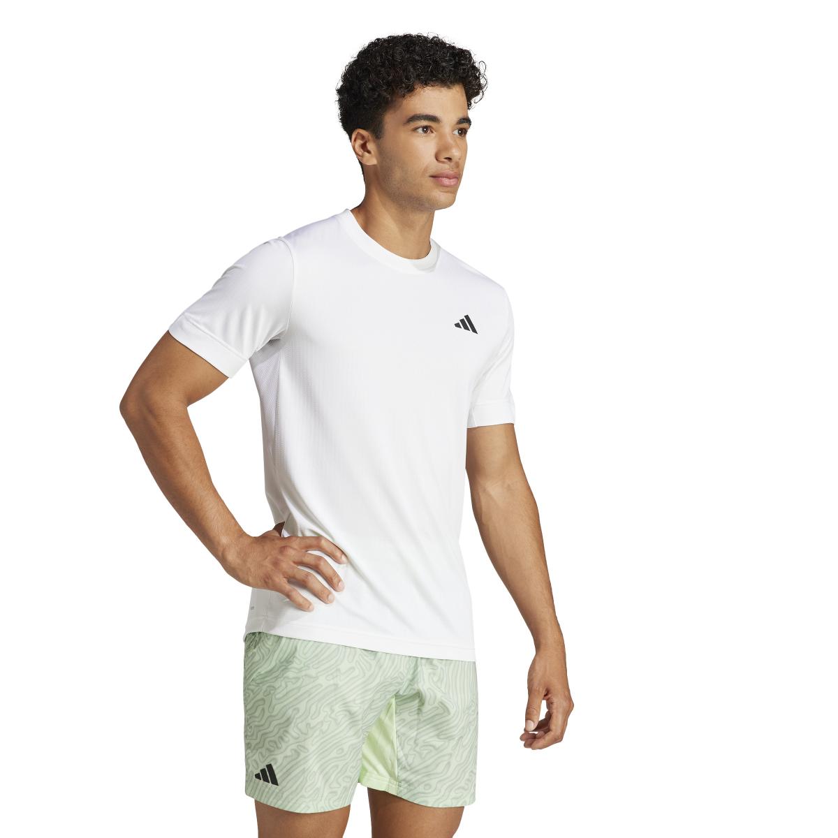 product/a/d/adidas_ip1946_7_apparel_on_model_walking_view_white-nw040724.jpg