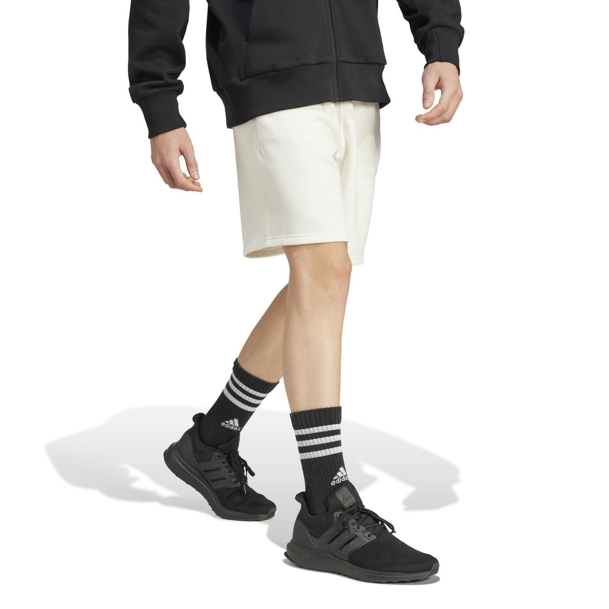 product/a/d/adidas_iy4130_5_apparel_on_model_walking_view_white.jpg