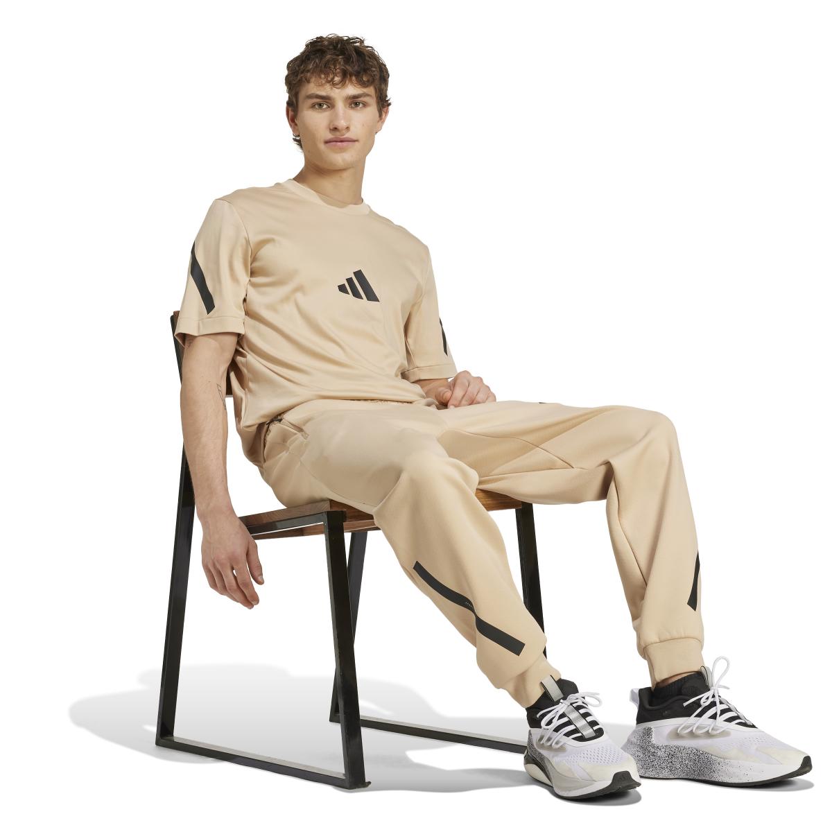product/a/d/adidas_jf2453_6_apparel_on_model_walking_view_white.jpg