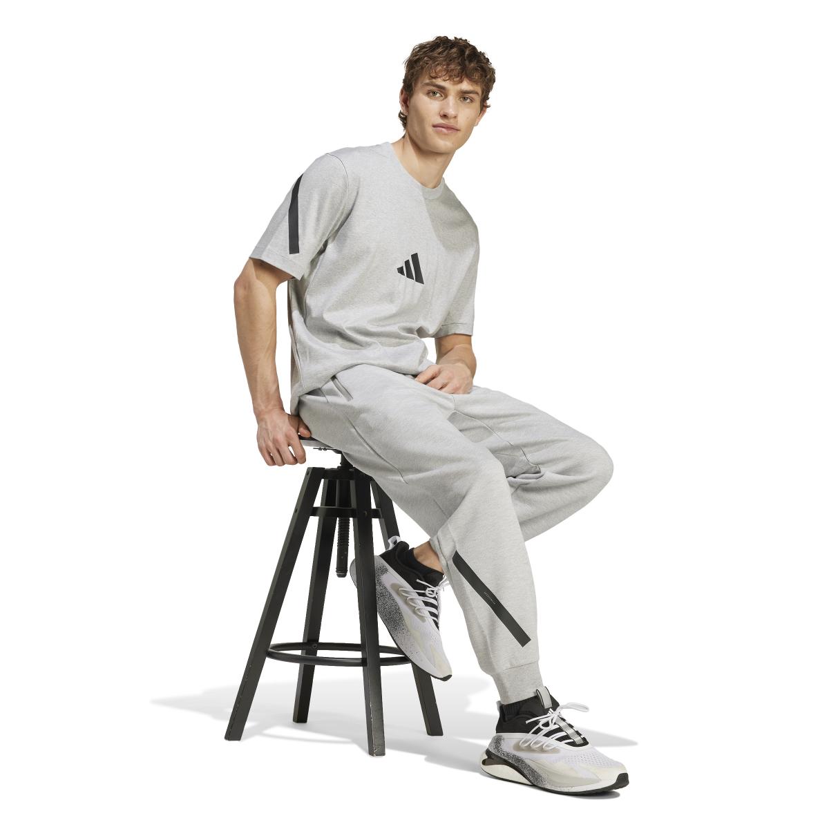 product/a/d/adidas_jf2457_6_apparel_on_model_walking_view_white.jpg