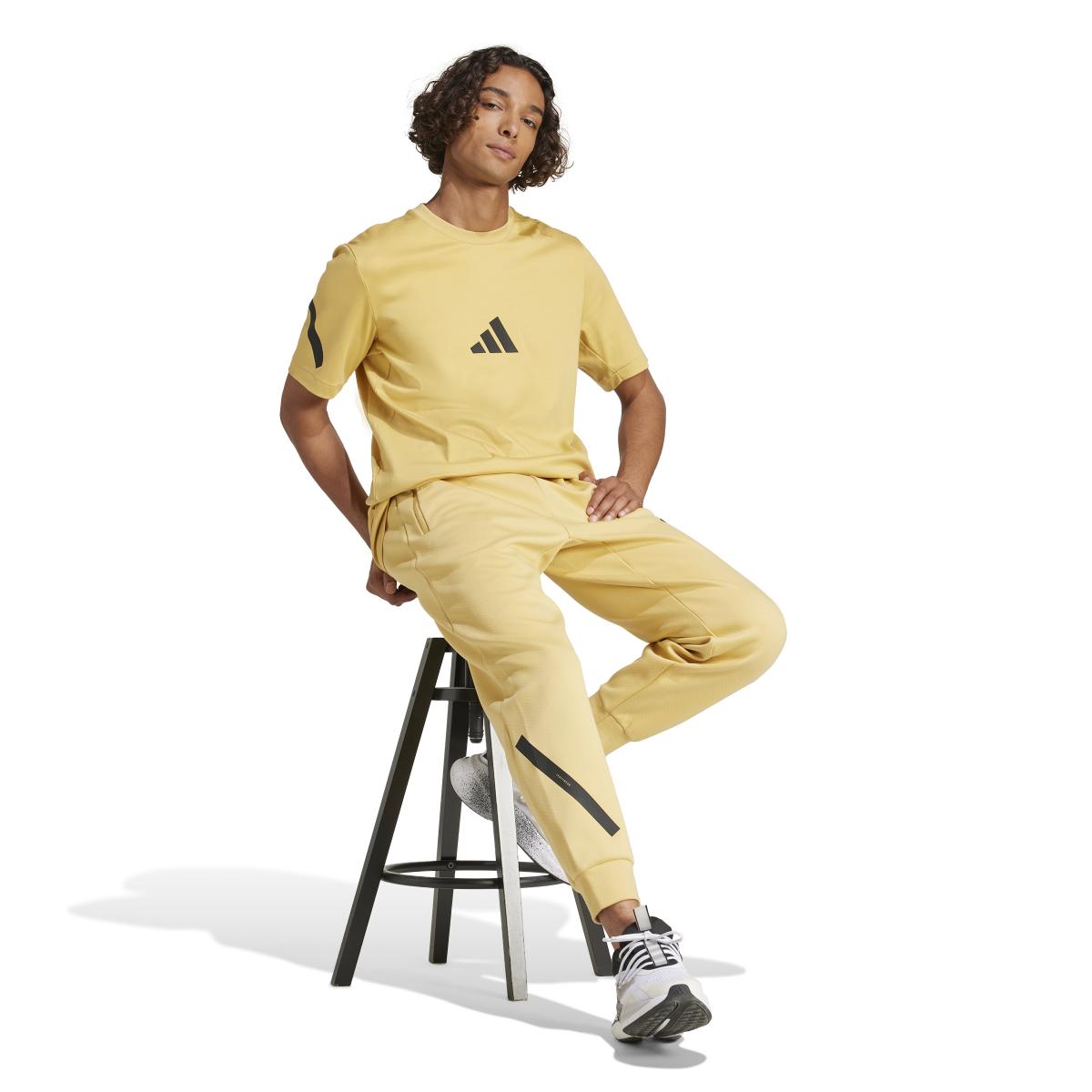 product/a/d/adidas_jf2458_6_apparel_on_model_walking_view_white.jpg