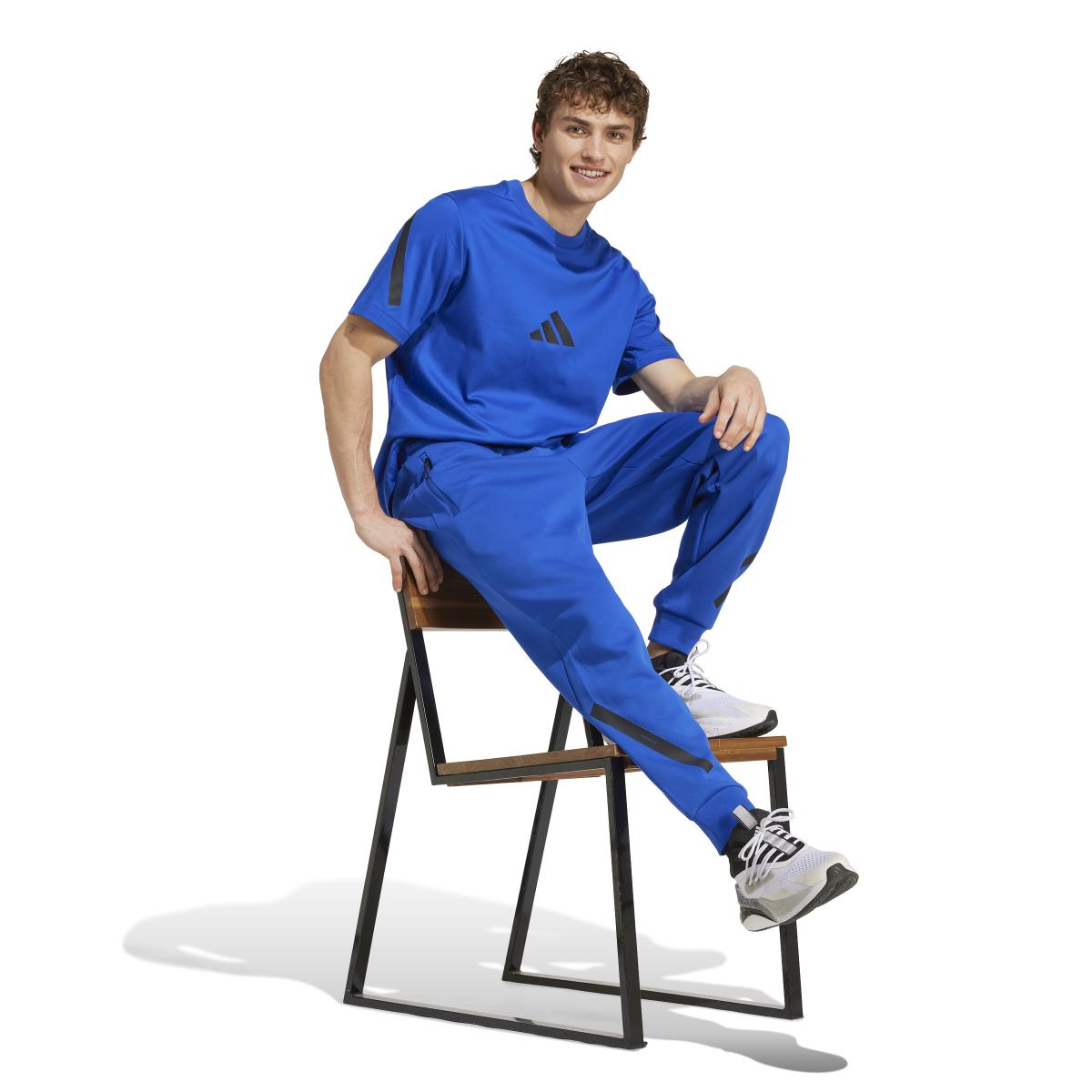 product/a/d/adidas_jf6543_6_apparel_on_model_walking_view_white.jpg