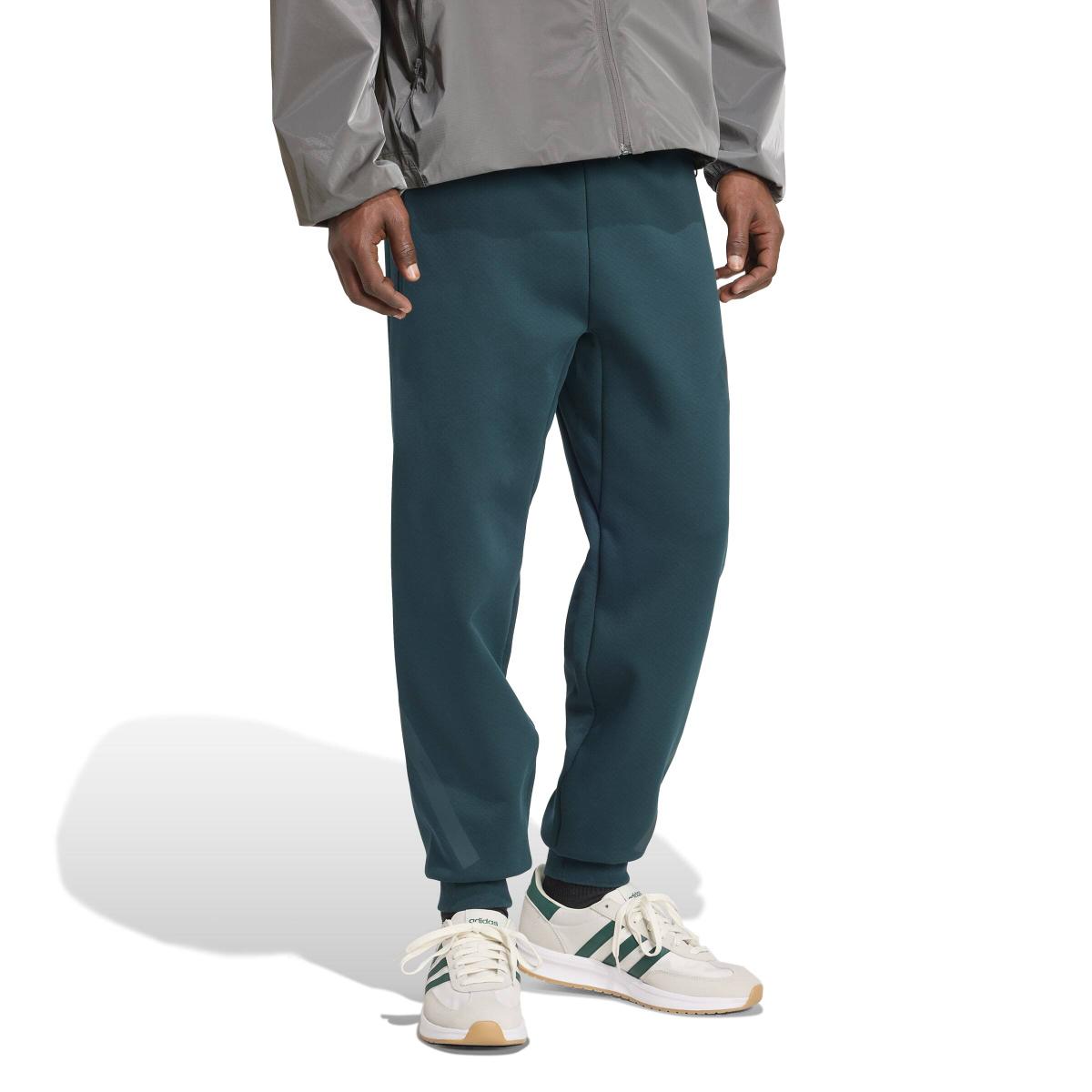 product/a/d/adidas_jw4724_4_apparel_on_model_walking_view_white.jpg
