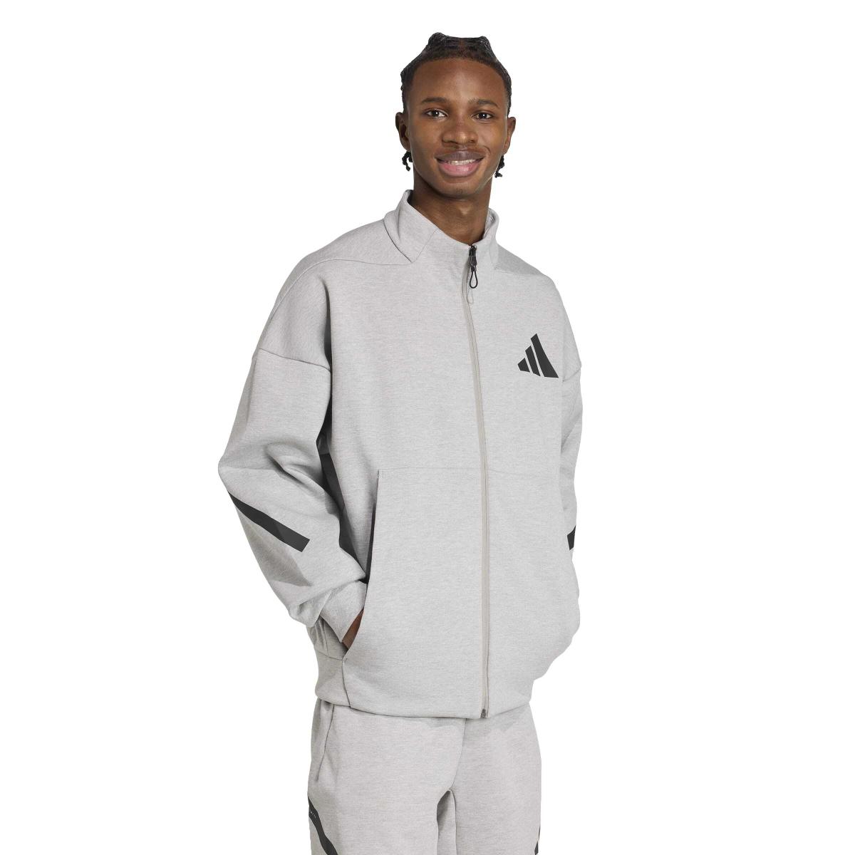 product/a/d/adidas_jx0638_4_apparel_on_model_walking_view_white.jpg