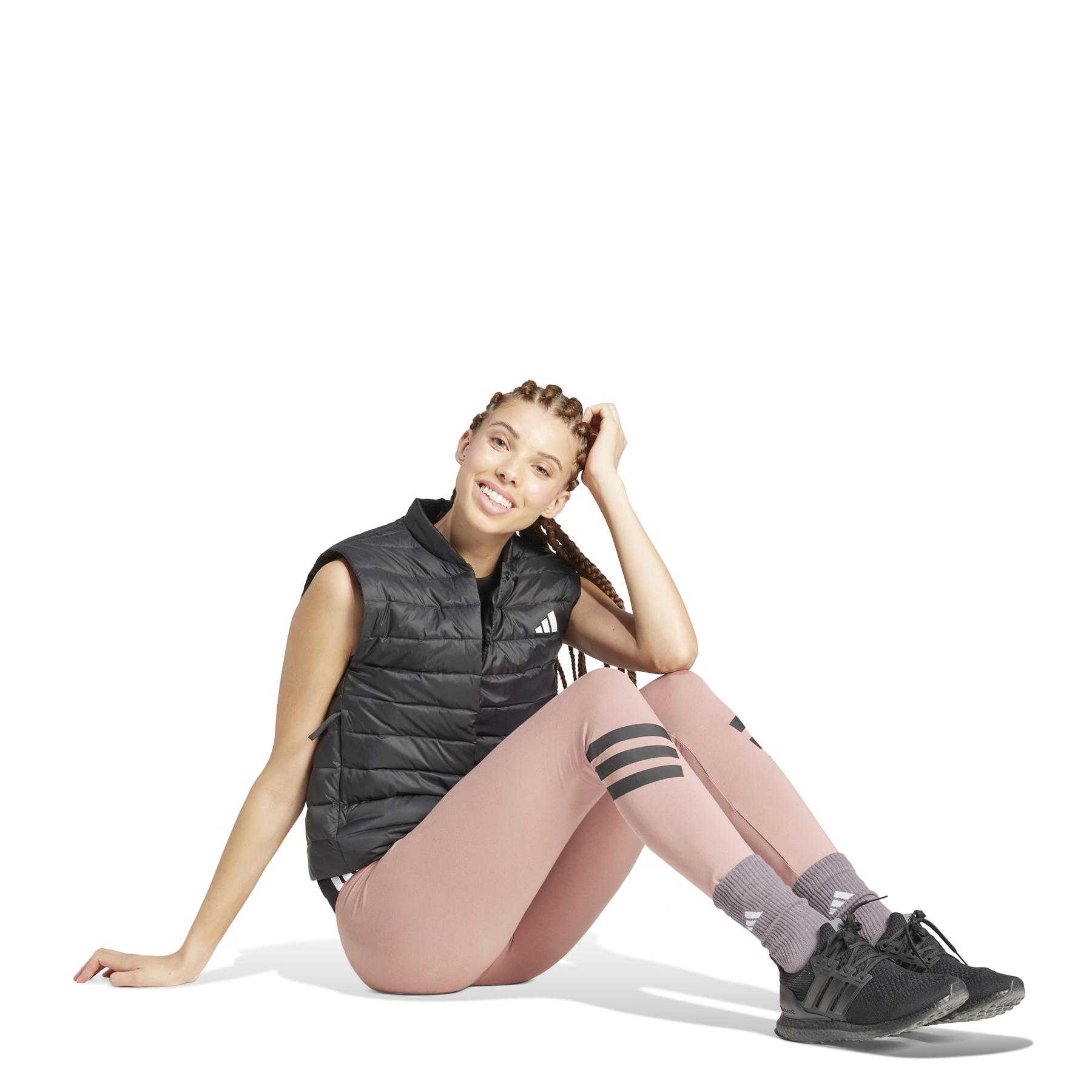 2/0/2025_adidas_jd1089_4_apparel_on_model_walking_view_white.jpg