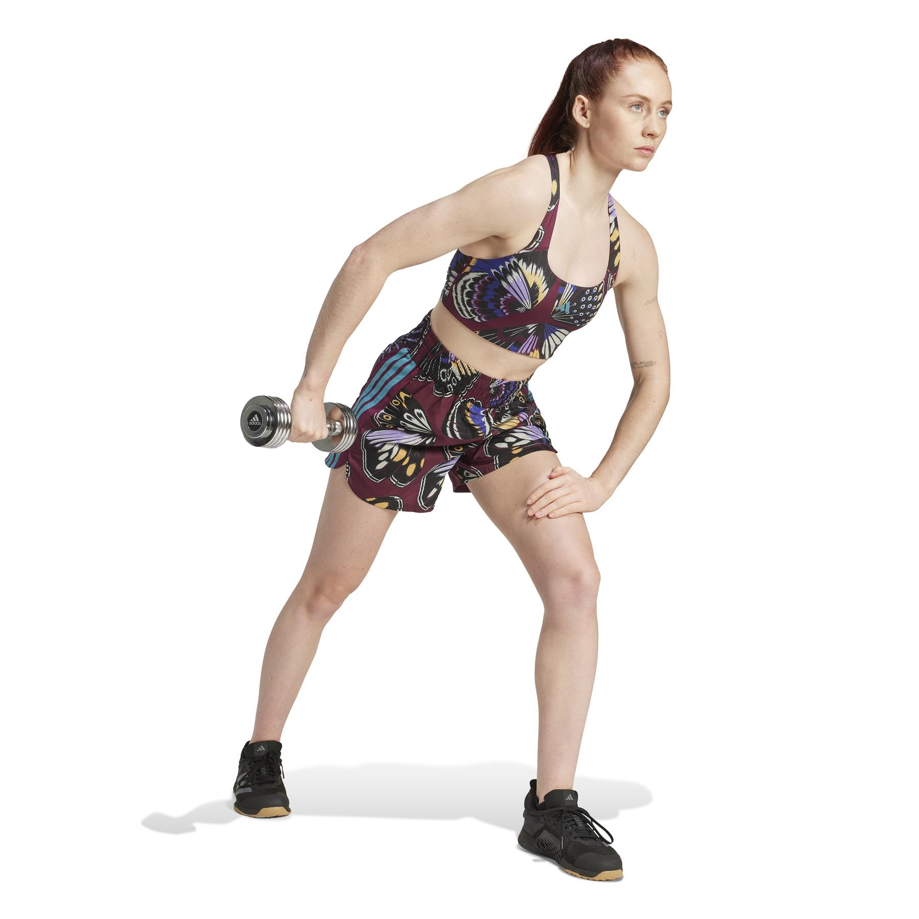 product/2/0/2025_adidas_jl7005_4_apparel_on_model_walking_view_white.jpg