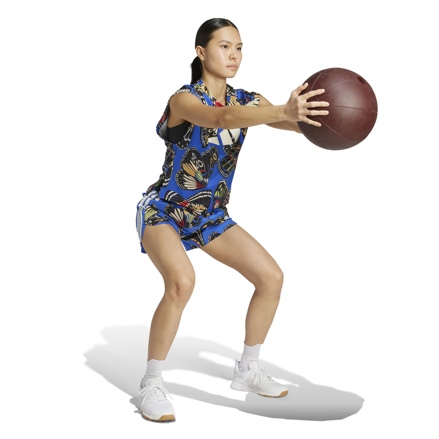 product/2/0/2025_adidas_jl7006_4_apparel_on_model_walking_view_white.jpg