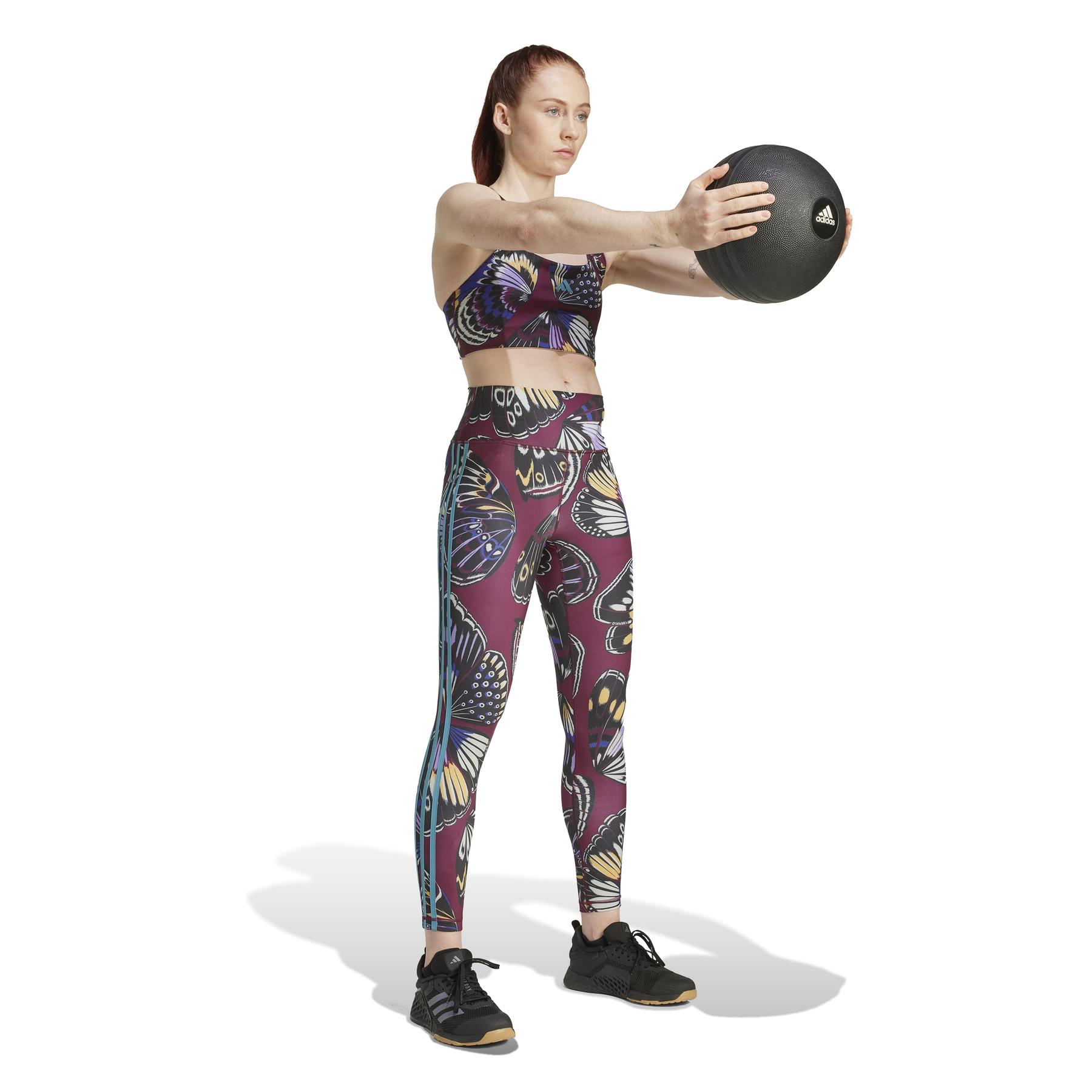 product/2/0/2025_adidas_jl8625_5_apparel_on_model_walking_view_white.jpg
