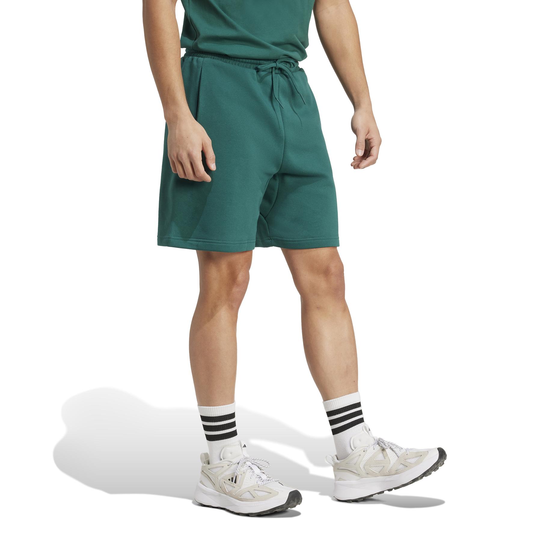 product/2/0/2025_adidas_jm1727_4_apparel_on_model_walking_view_white.jpg