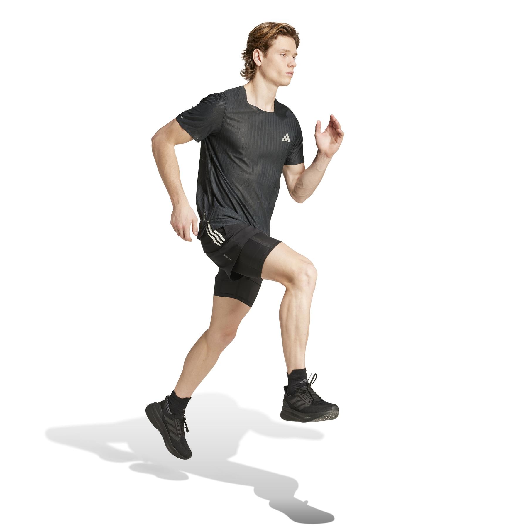 product/2/0/2025_adidas_jm5702_4_apparel_on_model_walking_view_white.jpg