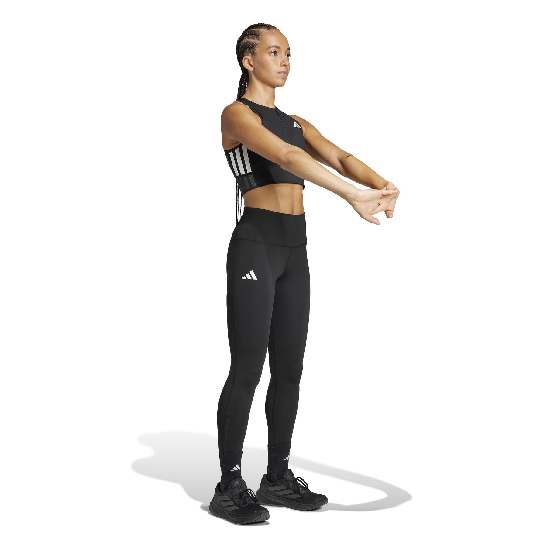product/2/0/2025_adidas_jn7162_4_apparel_on_model_walking_view_white.jpg