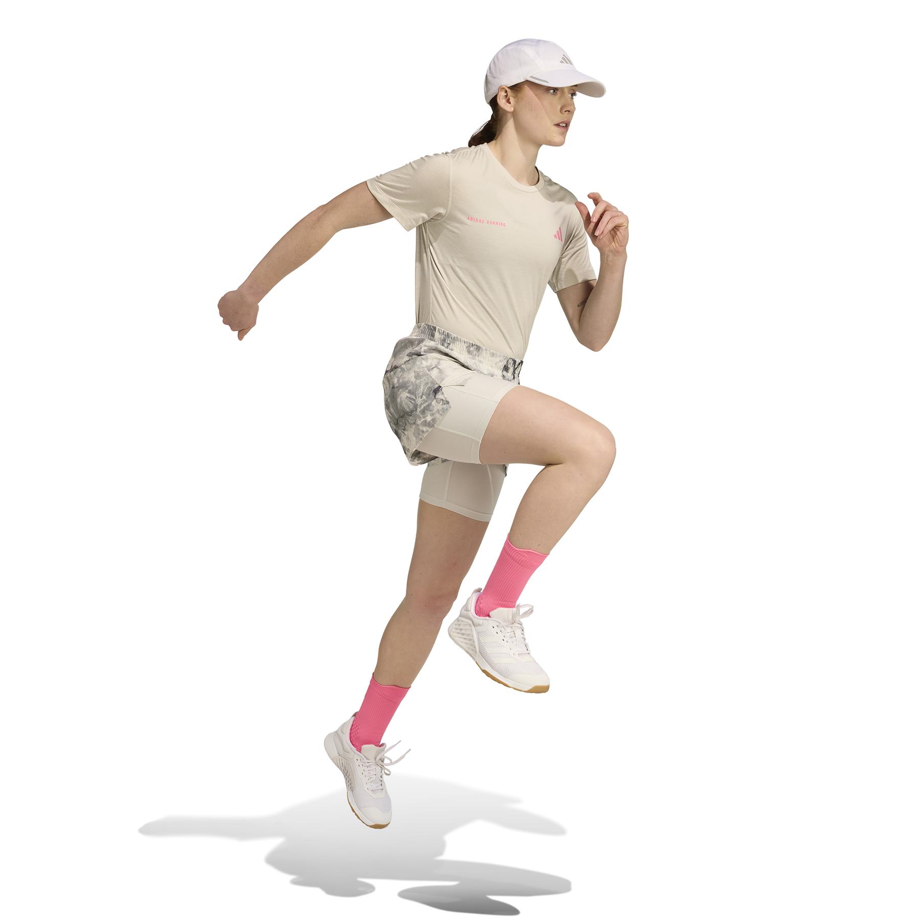 product/2/0/2025_adidas_jn9669_4_apparel_on_model_walking_view_white.jpg