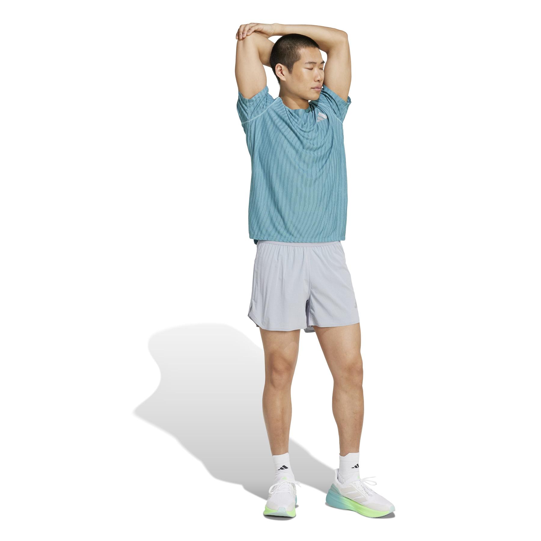product/2/0/2025_adidas_jp3851_4_apparel_on_model_walking_view_white.jpg