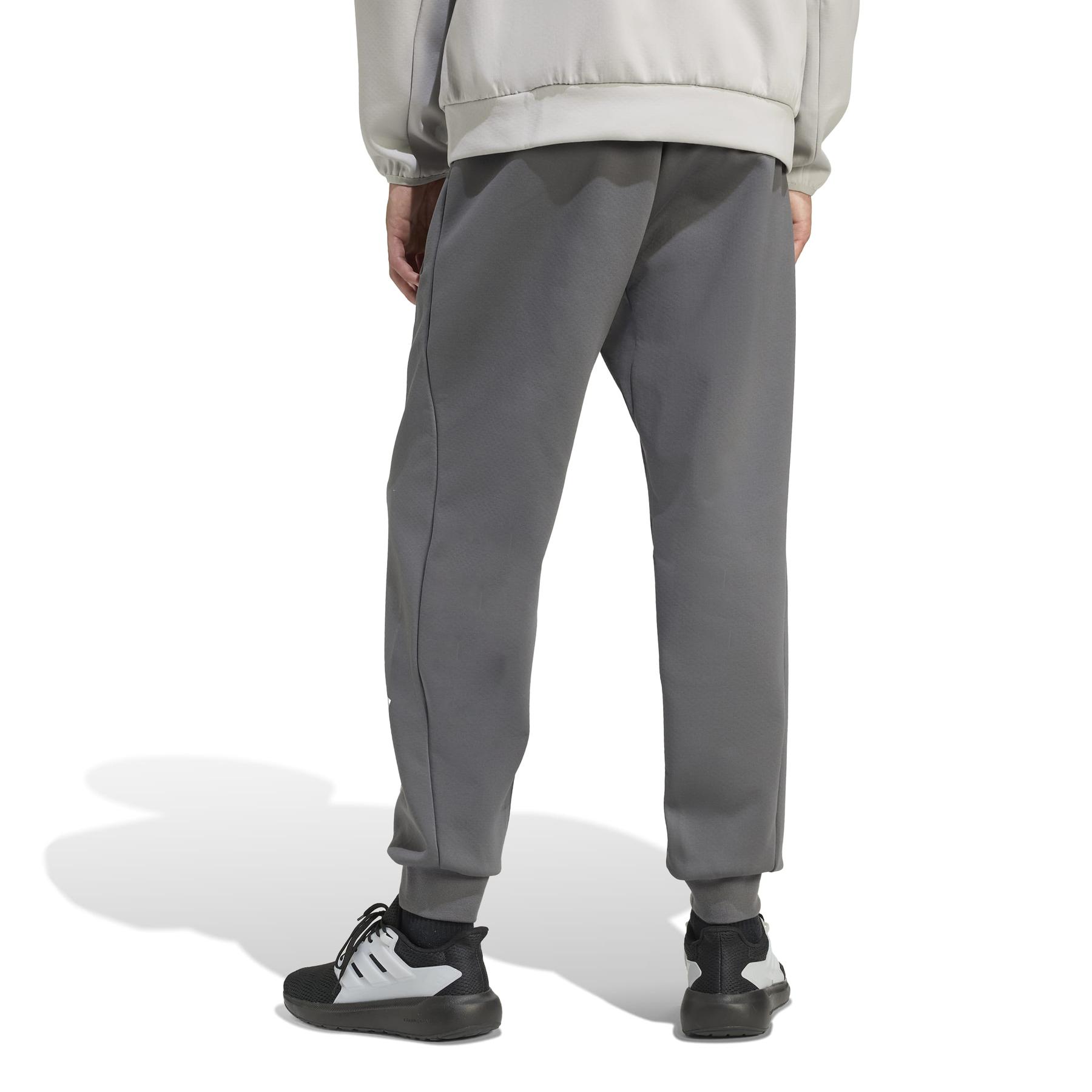 2/0/2025_adidas_jw3478_3_apparel_on_model_back_view_white.jpg