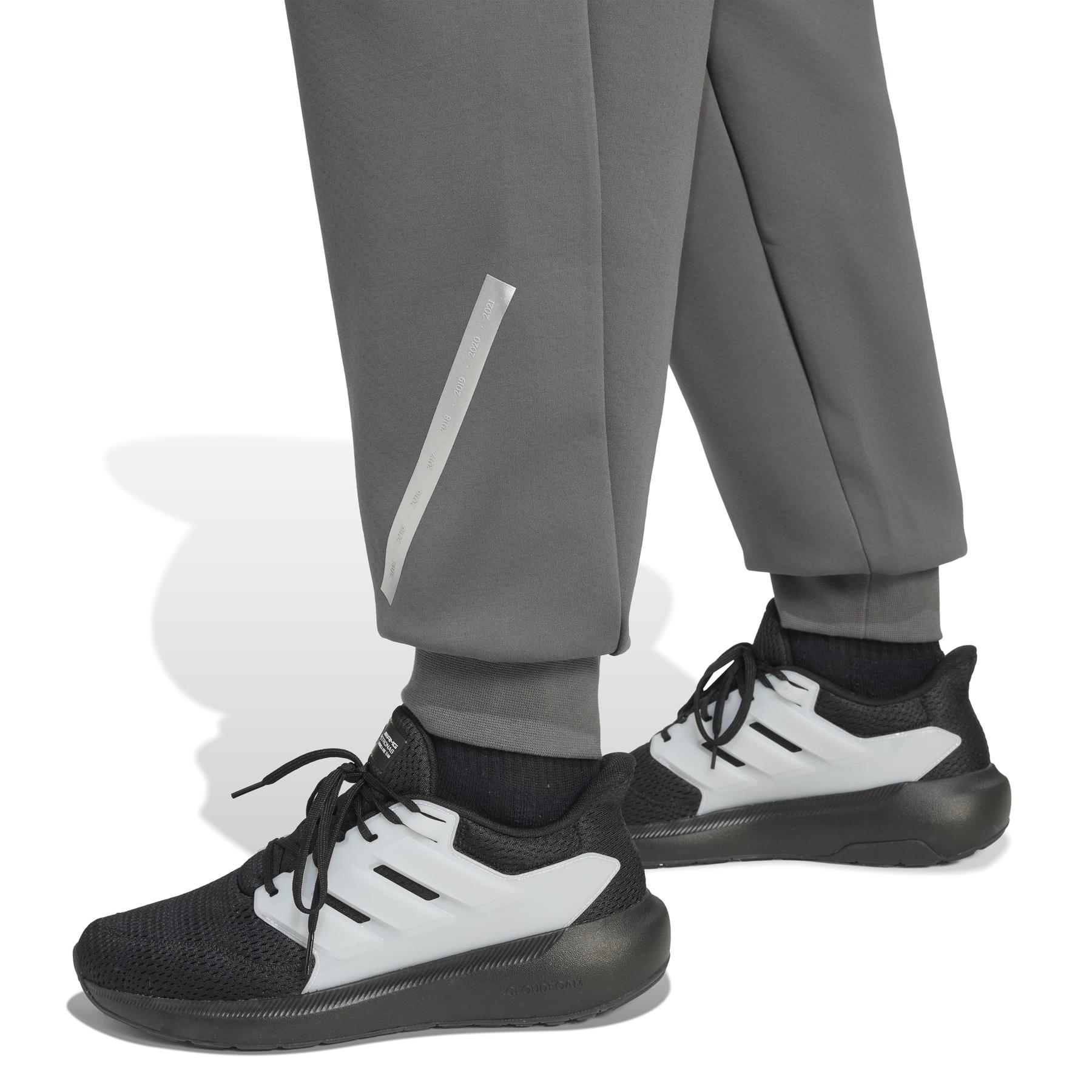 2/0/2025_adidas_jw3478_6_apparel_on_model_detail_view_1_white.jpg