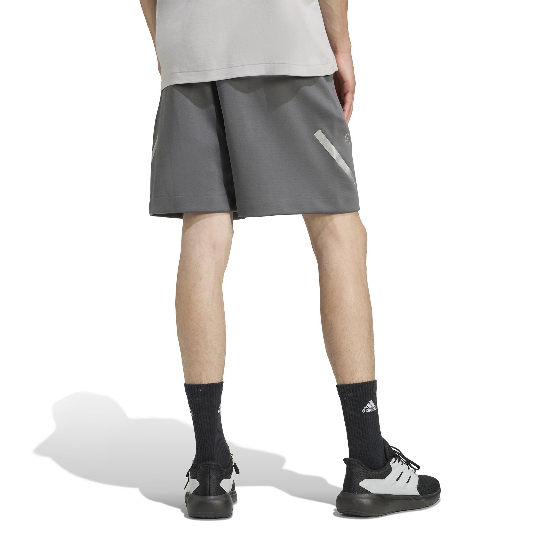 2/0/2025_adidas_jw3479_3_apparel_on_model_back_view_white.jpg