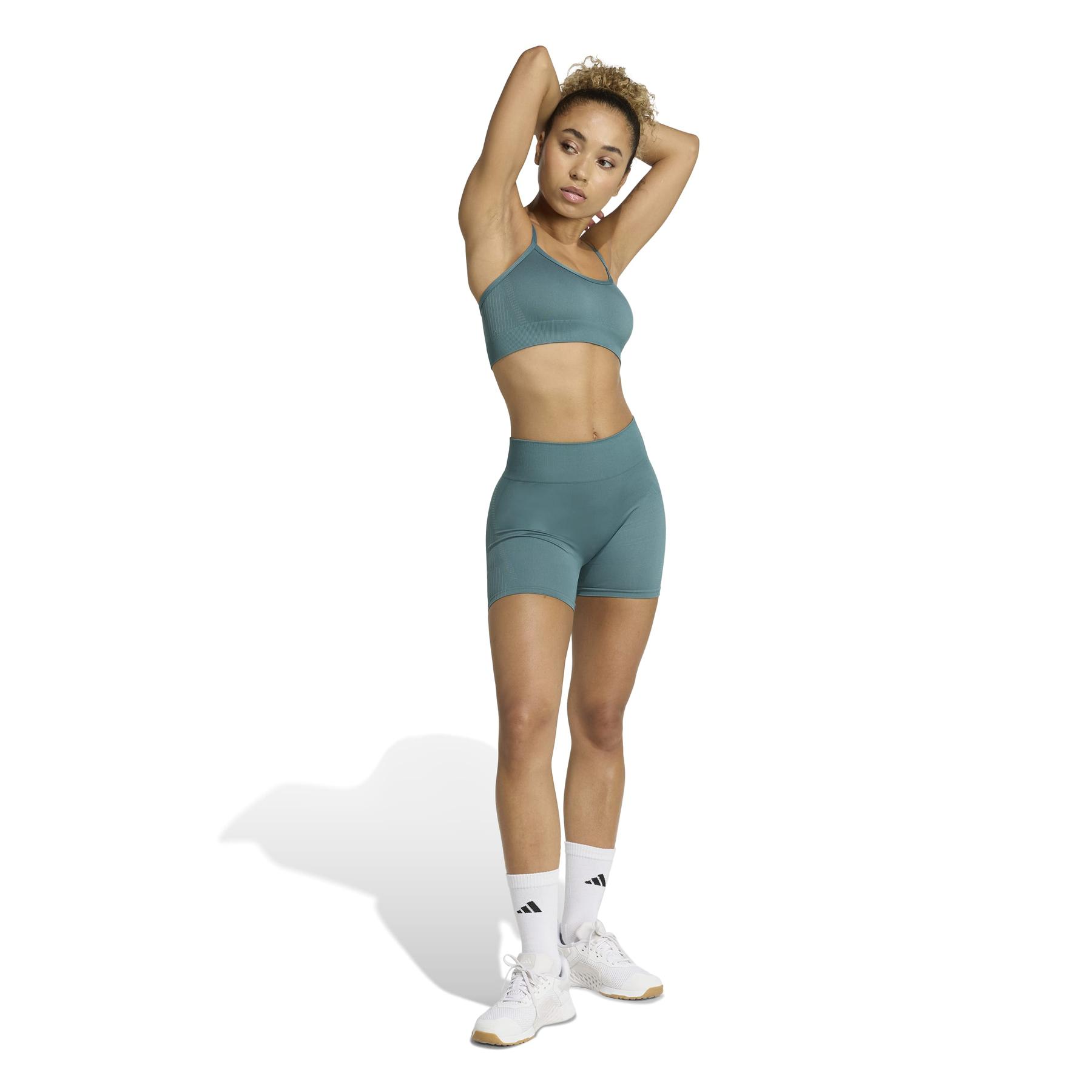 product/2/0/2025_adidas_jx3927_4_apparel_on_model_walking_view_white.jpg