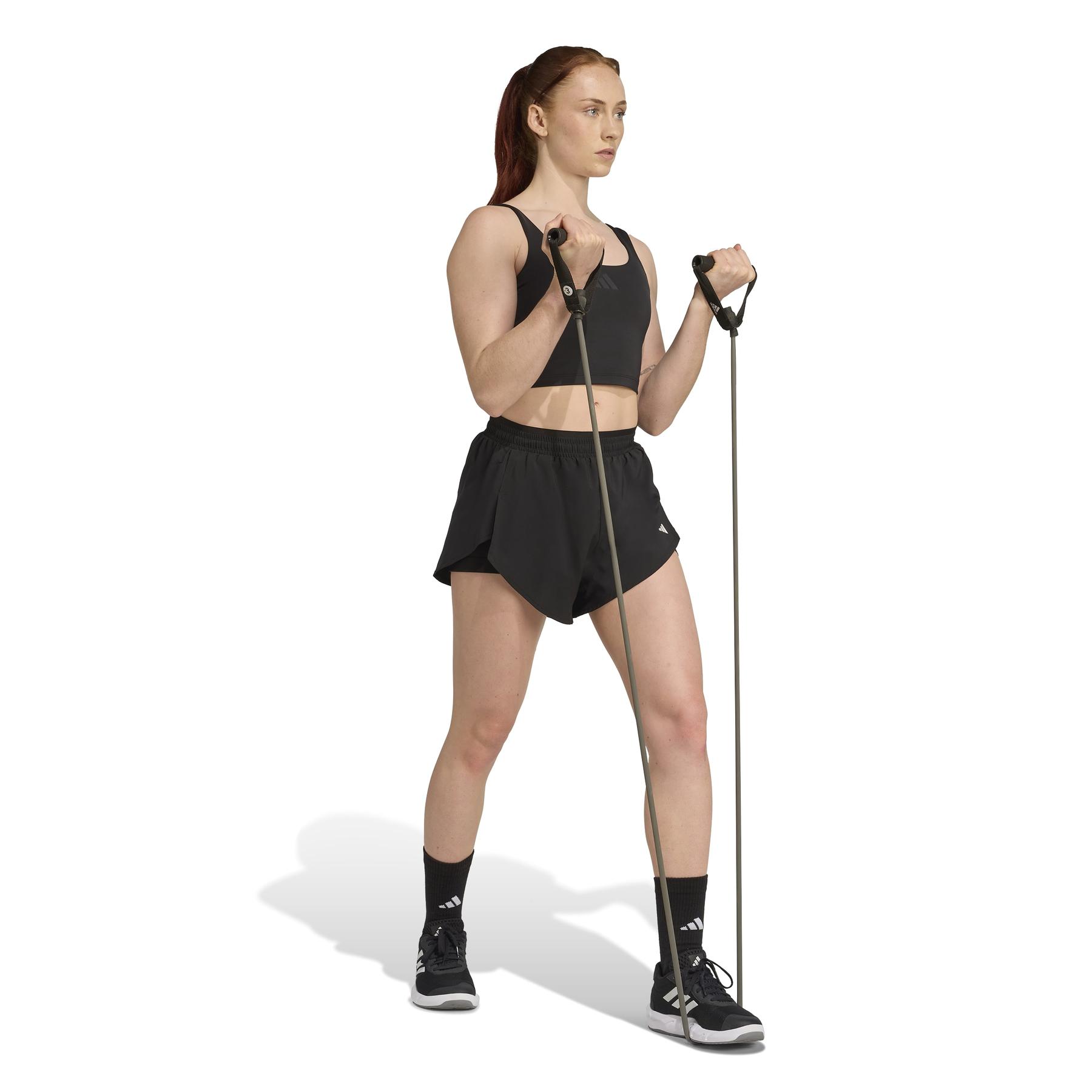 2/0/2025_adidas_jz6030_4_apparel_on_model_walking_view_white.jpg