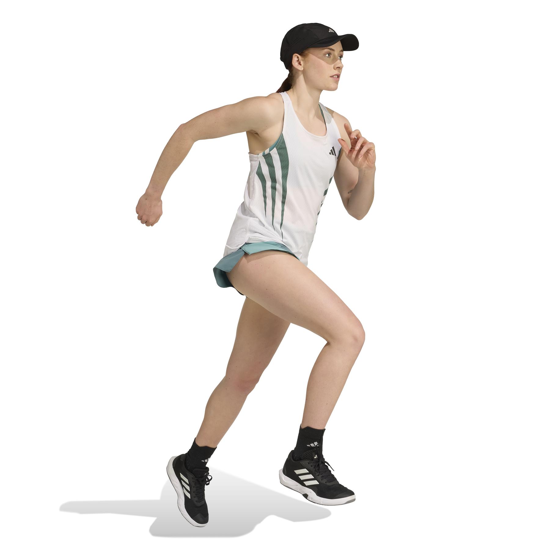 product/2/0/2025_adidas_jz8034_4_apparel_on_model_walking_view_white.jpg