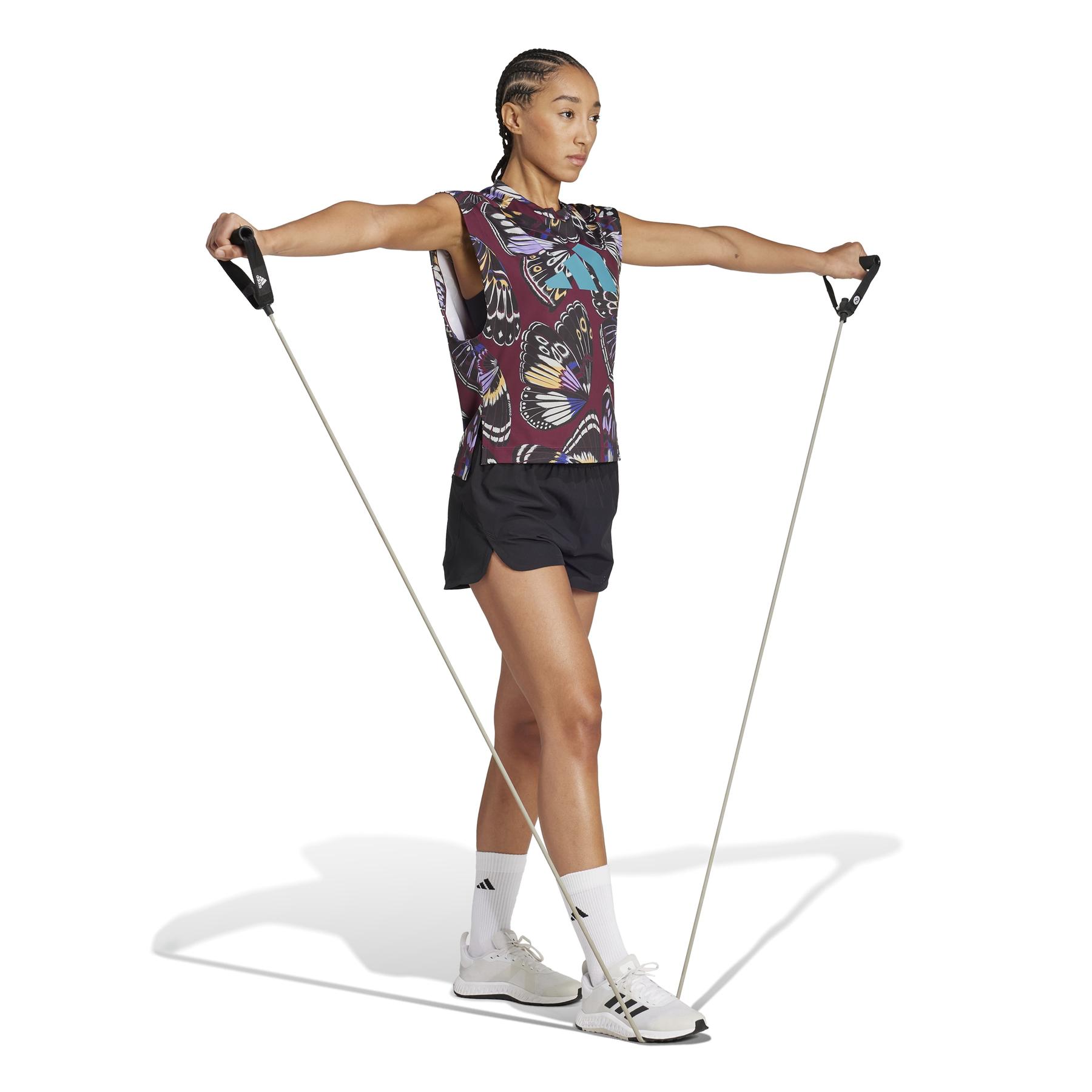 product/2/0/2025_adidas_ka6364_4_apparel_on_model_walking_view_white.jpg