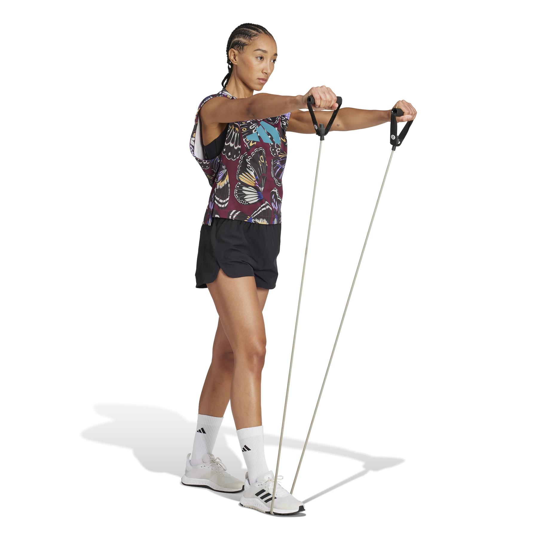 product/2/0/2025_adidas_kb5567_4_apparel_on_model_walking_view_white.jpg