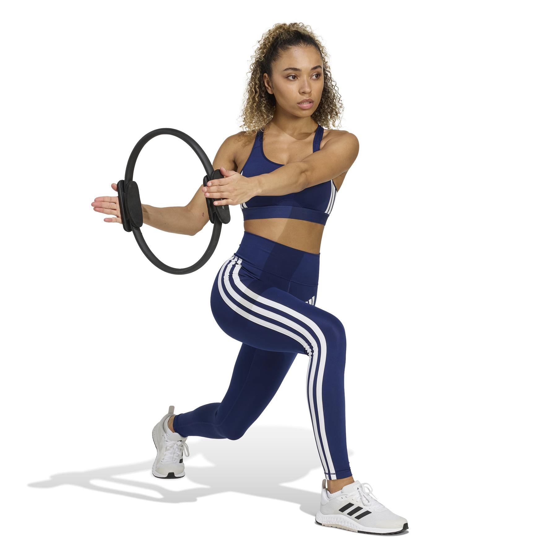 product/2/0/2025_adidas_kb7381_4_apparel_on_model_walking_view_white.jpg