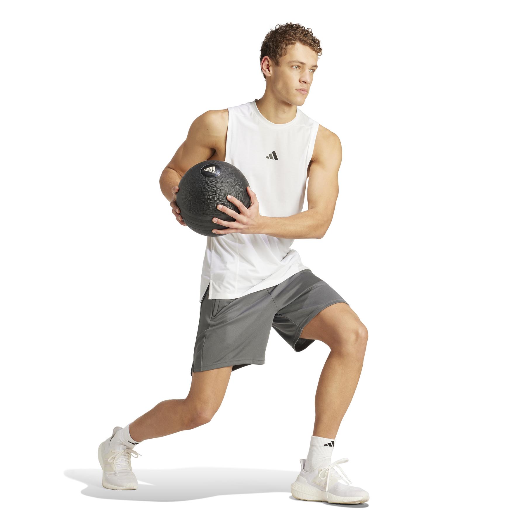 a/d/adidas_ia3902_5_apparel_on_model_walking_view_white.jpg