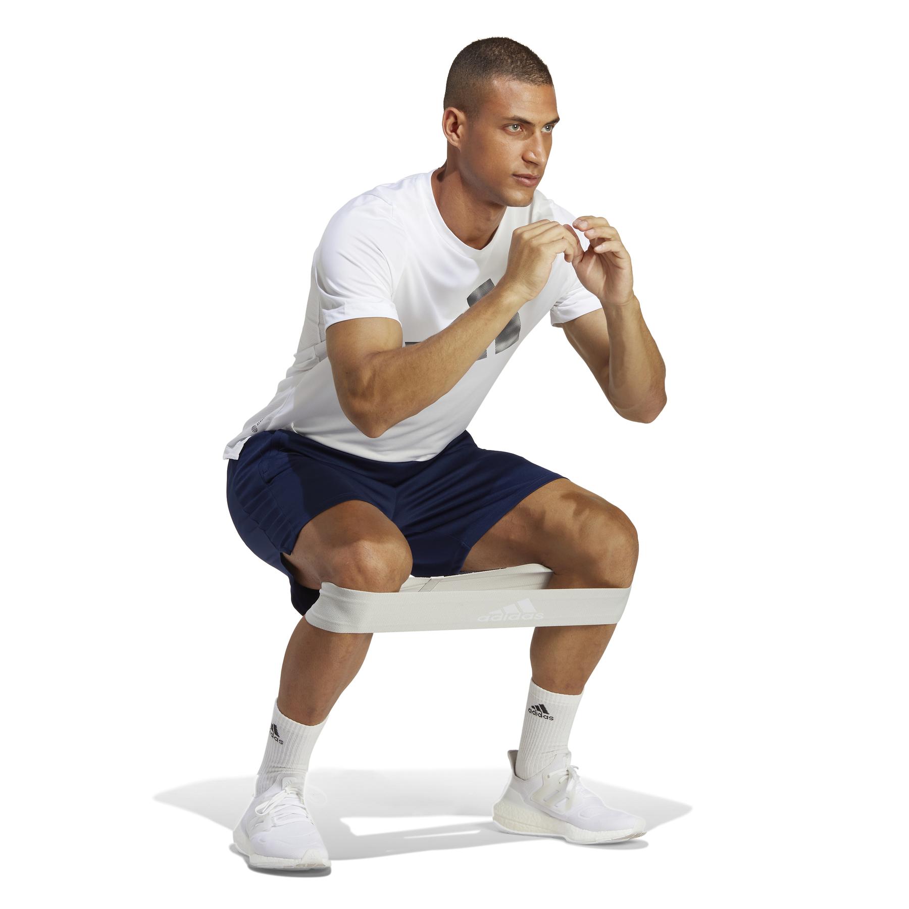a/d/adidas_ib8162_5_apparel_on_model_walking_view_white.jpg
