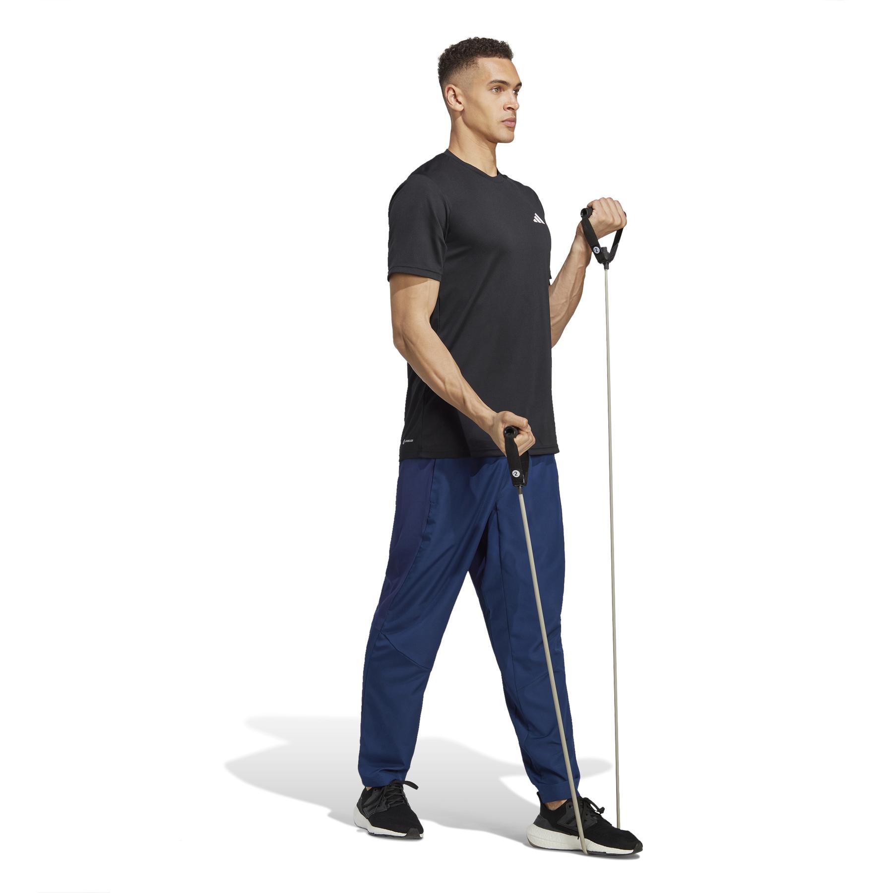 a/d/adidas_ic7428_6_apparel_on_model_walking_view_white.jpg