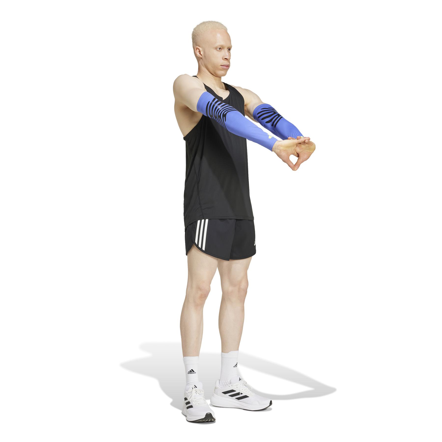 a/d/adidas_is5689_4_apparel_on_model_walking_view_white.jpg