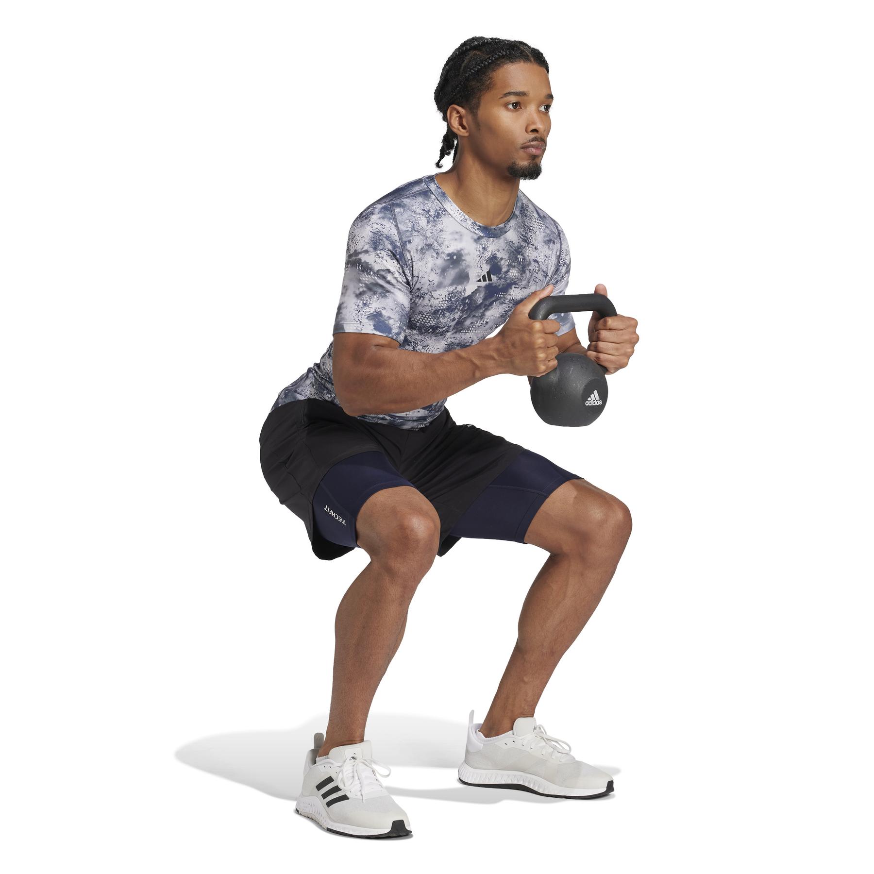 a/d/adidas_iw5840_5_apparel_on_model_walking_view_white.jpg