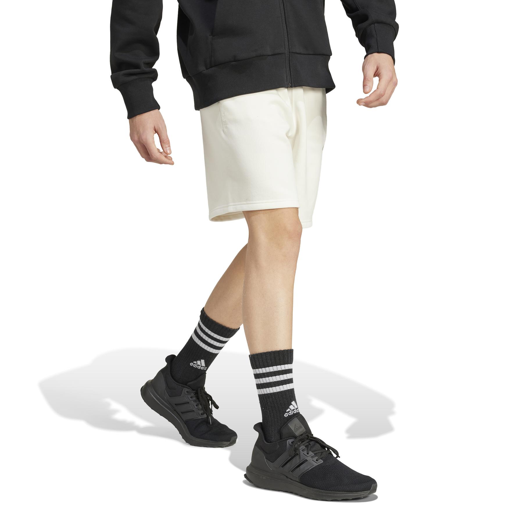 product/a/d/adidas_iy4130_5_apparel_on_model_walking_view_white.jpg
