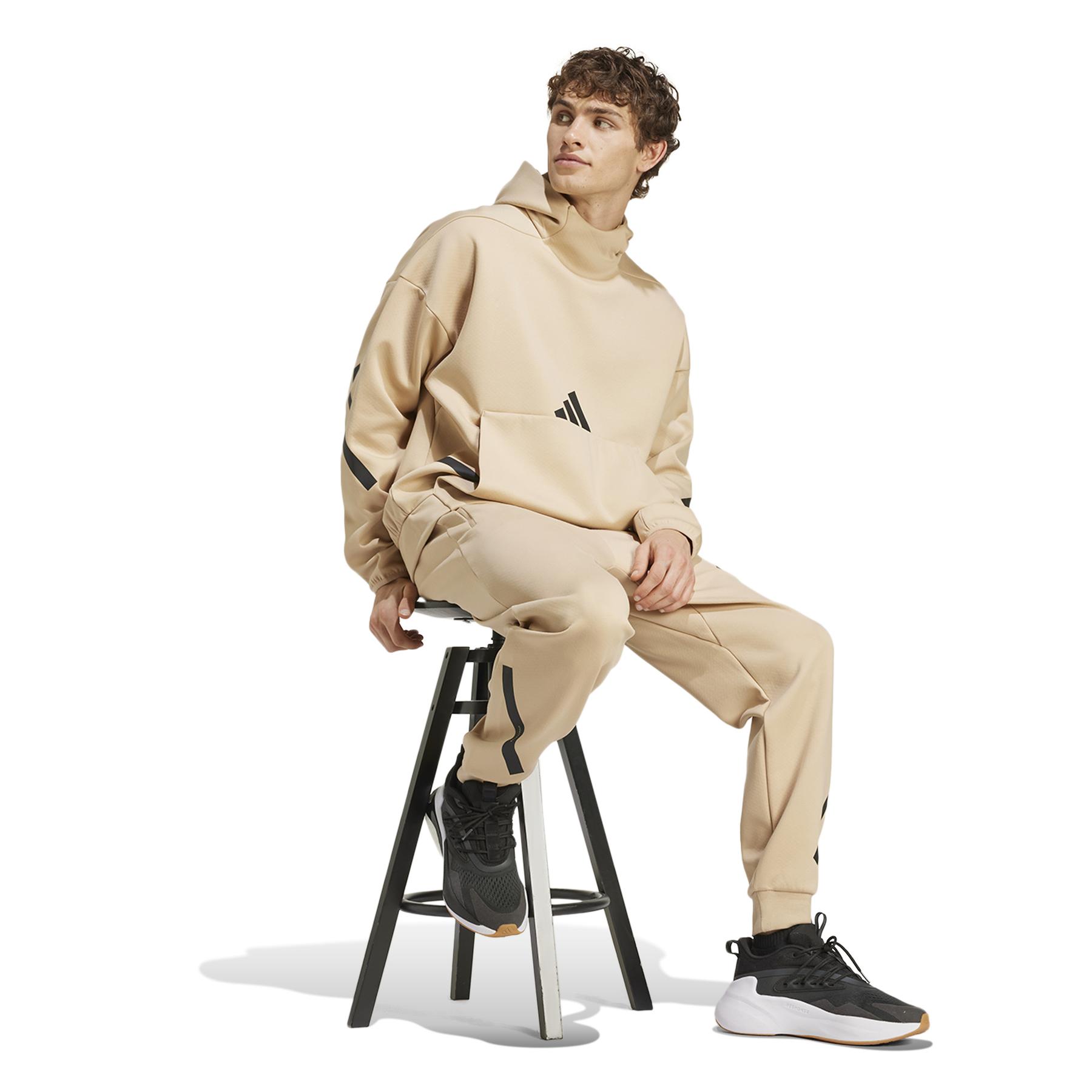 product/a/d/adidas_je7539_5_apparel_on_model_walking_view_white.jpg