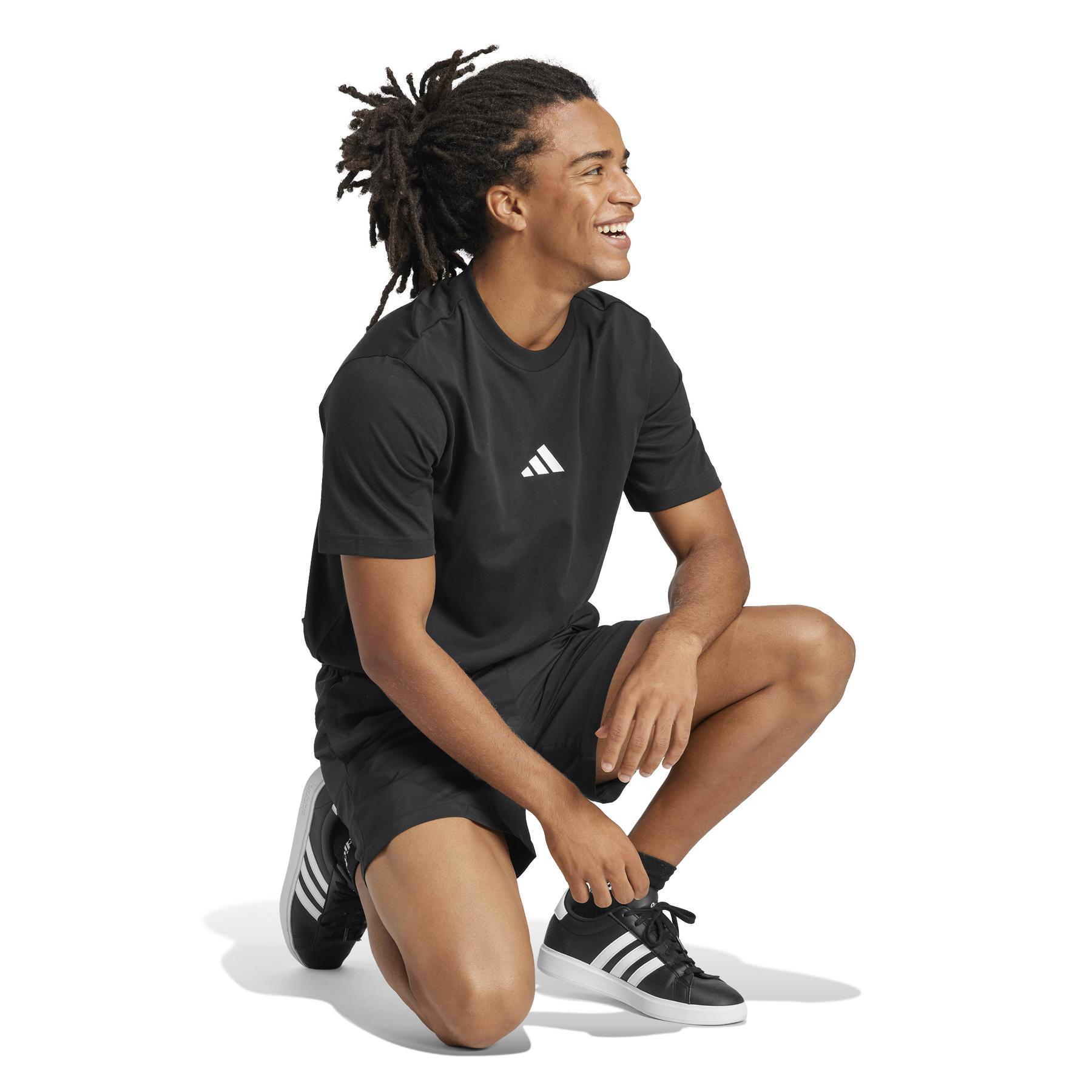 a/d/adidas_je9024_5_apparel_on_model_walking_view_white.jpg