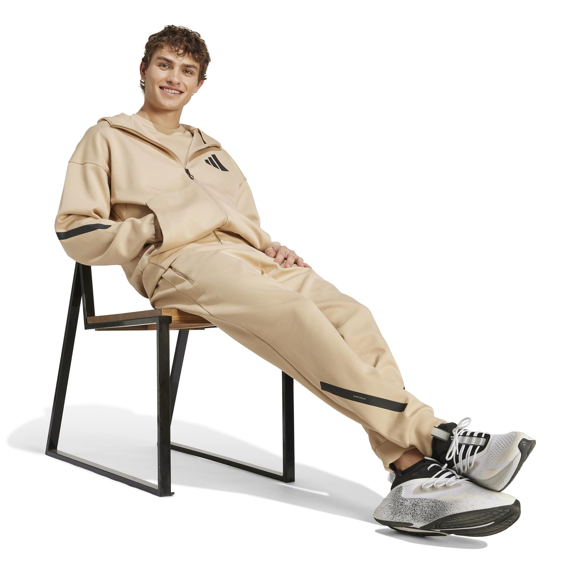 a/d/adidas_jf2445_6_apparel_on_model_walking_view_white.jpg