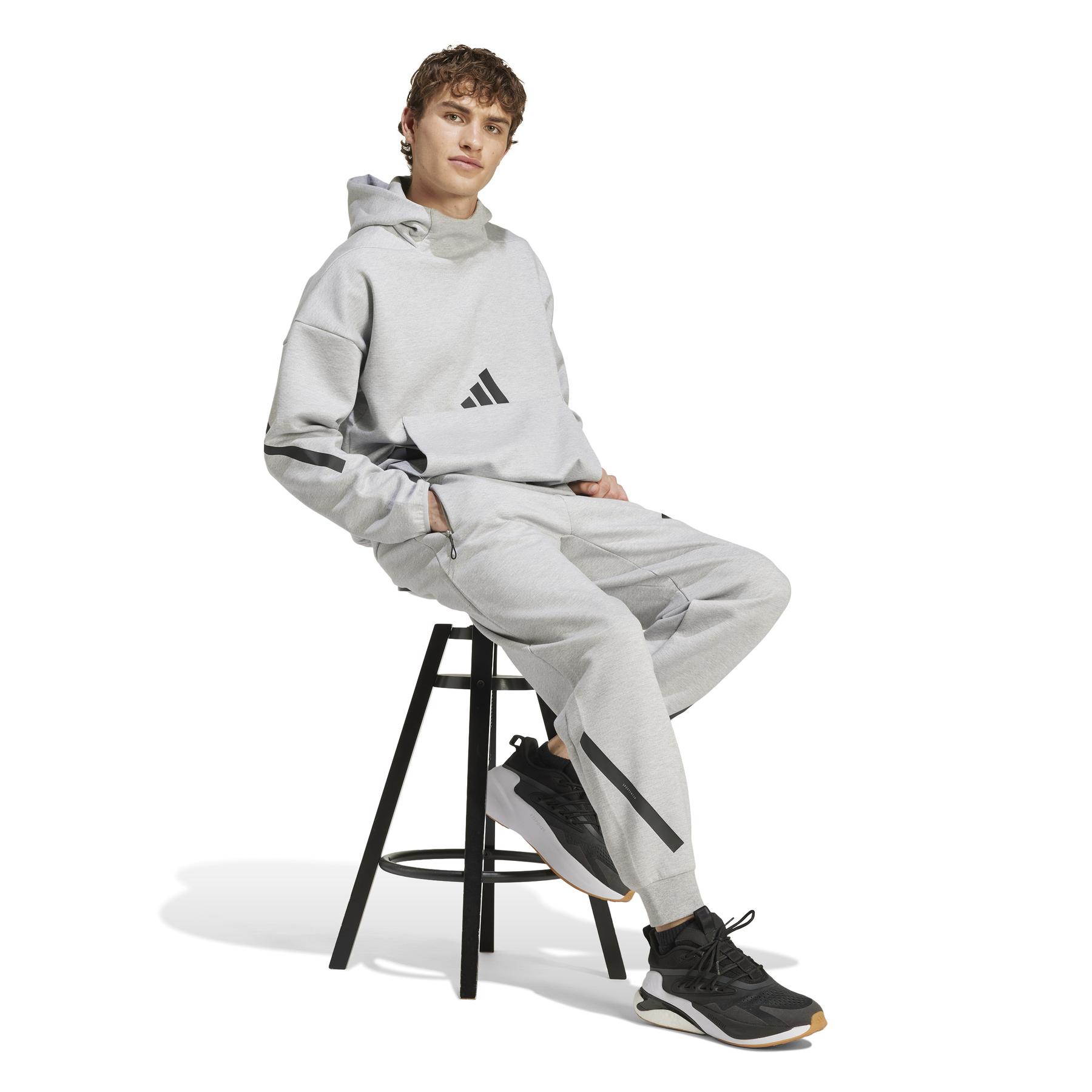 product/a/d/adidas_jf2446_5_apparel_on_model_walking_view_white.jpg