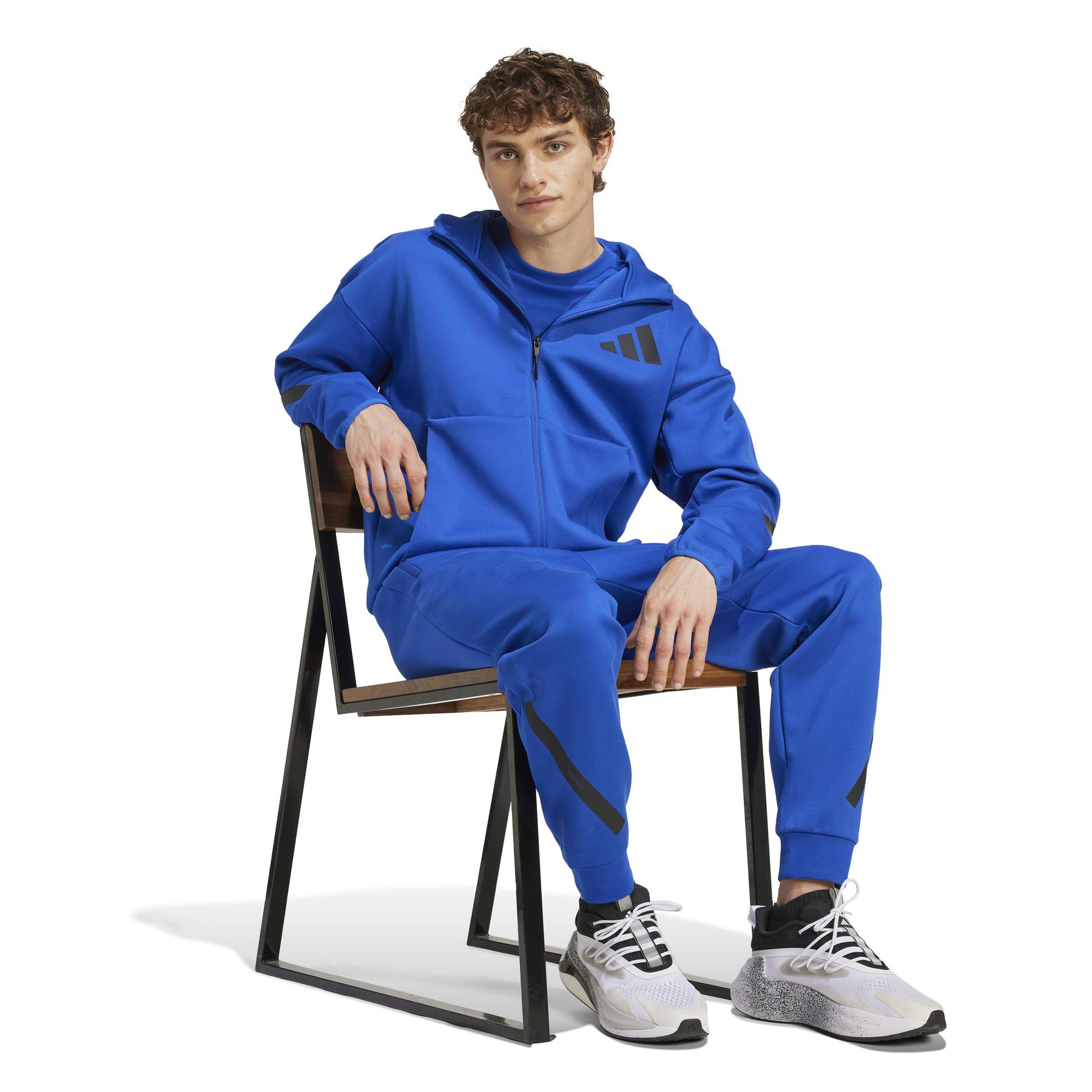 a/d/adidas_jf6388_6_apparel_on_model_walking_view_white.jpg