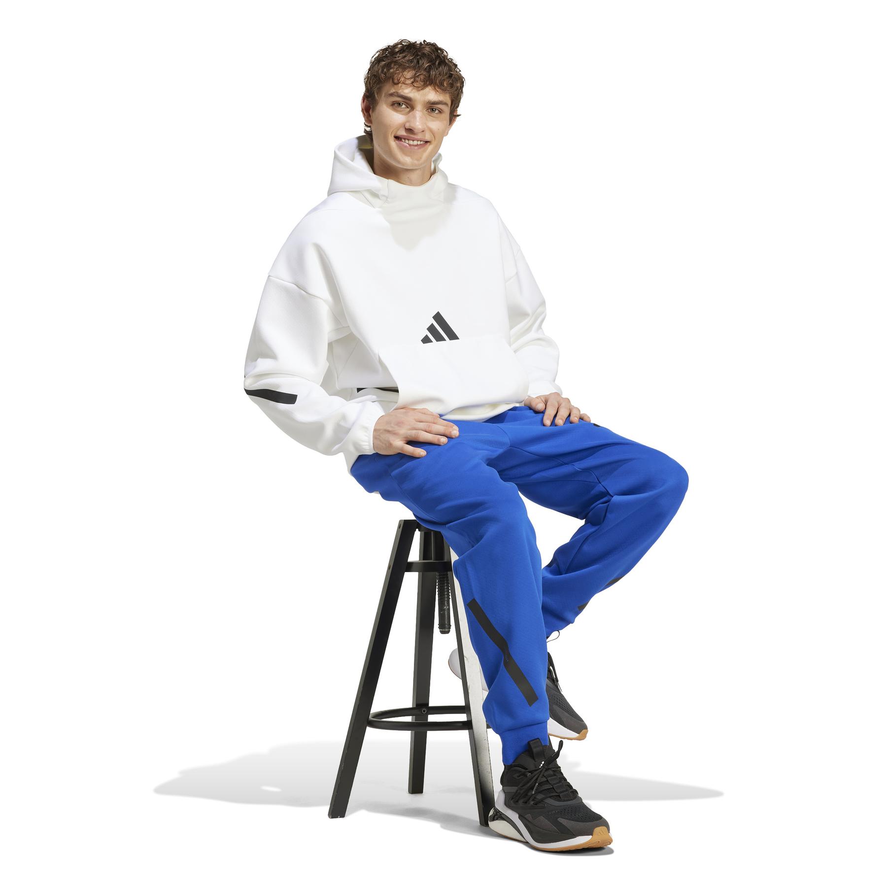 product/a/d/adidas_jf6541_5_apparel_on_model_walking_view_white.jpg