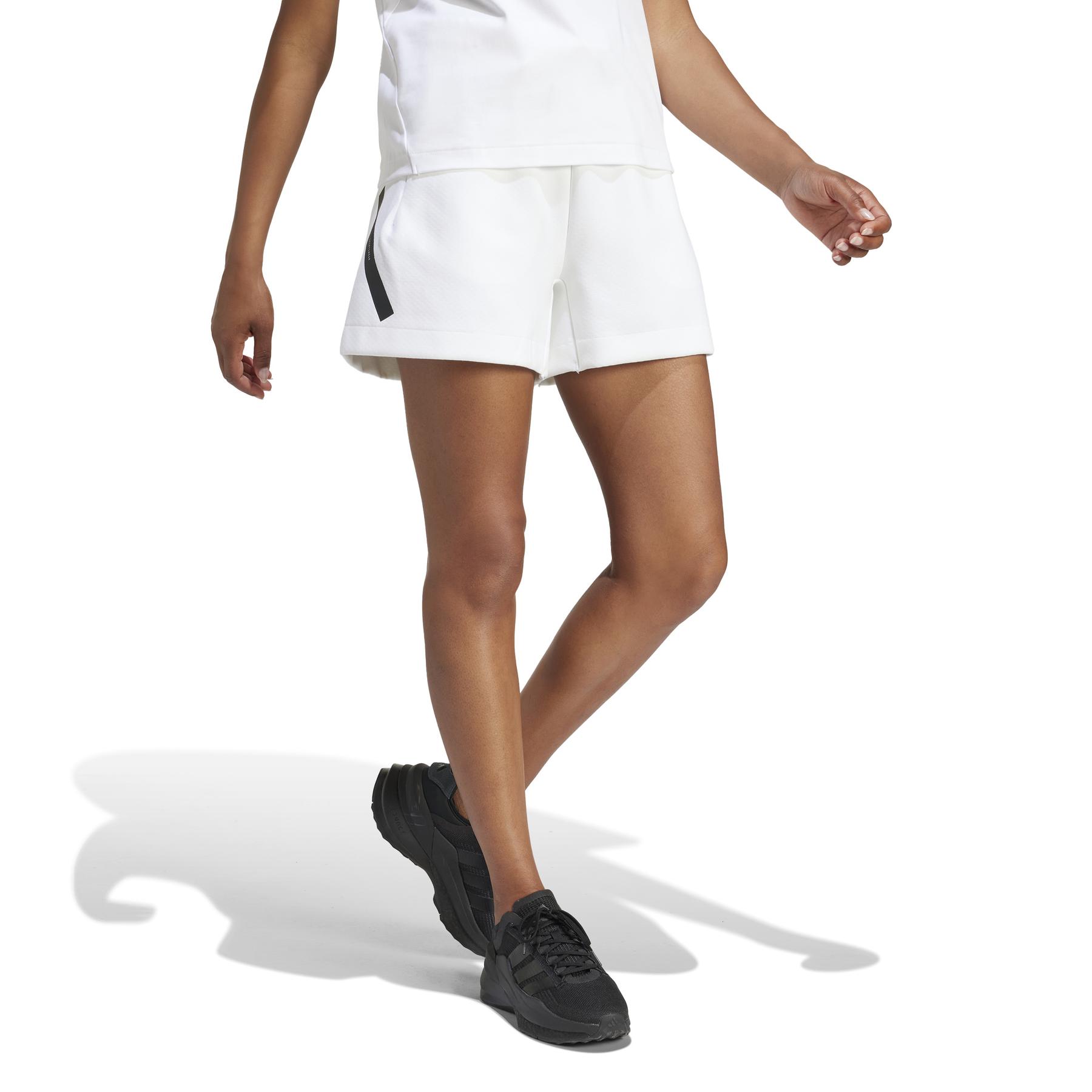a/d/adidas_jj4678_5_apparel_on_model_walking_view_white.jpg