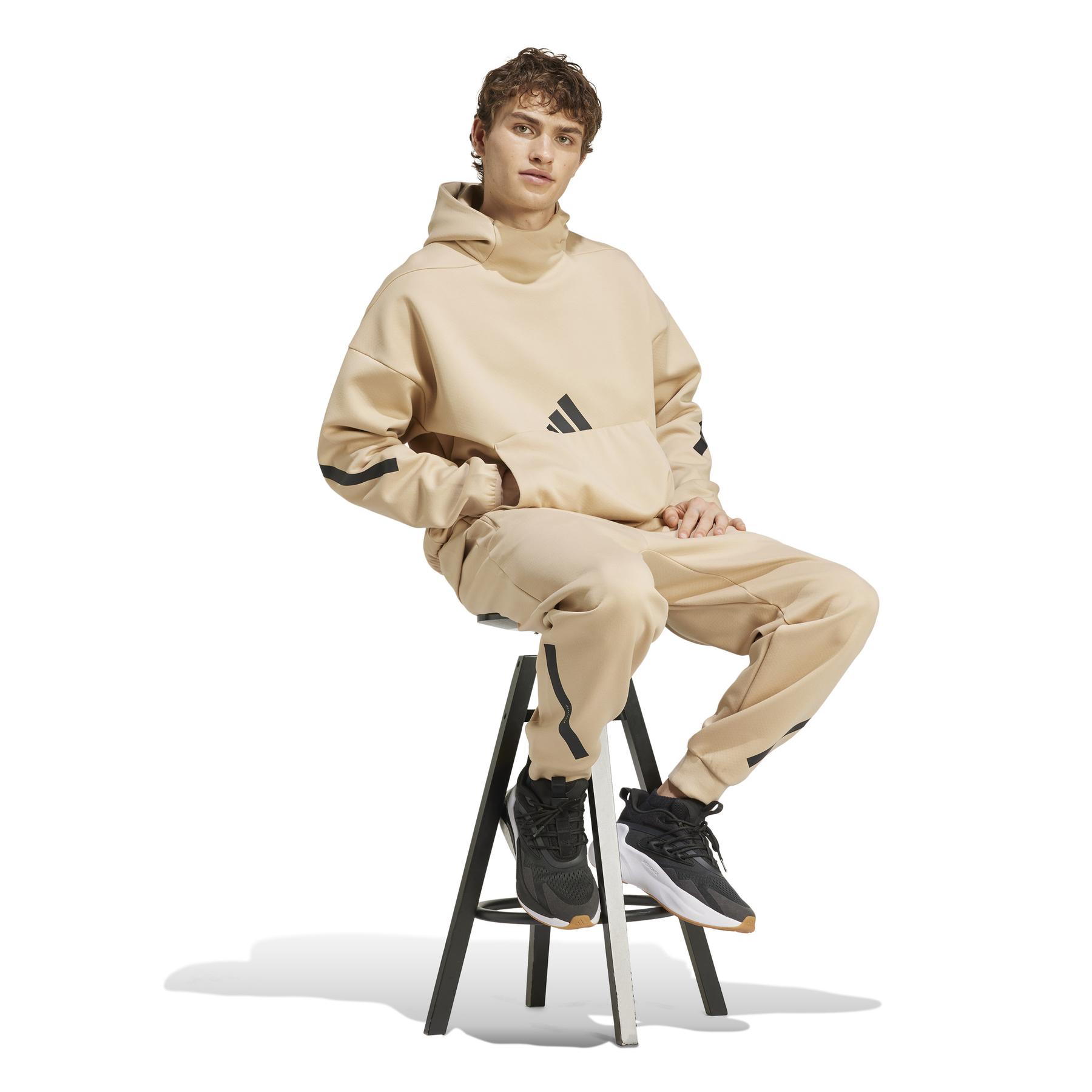 product/a/d/adidas_jj4894_6_apparel_on_model_walking_view_white.jpg