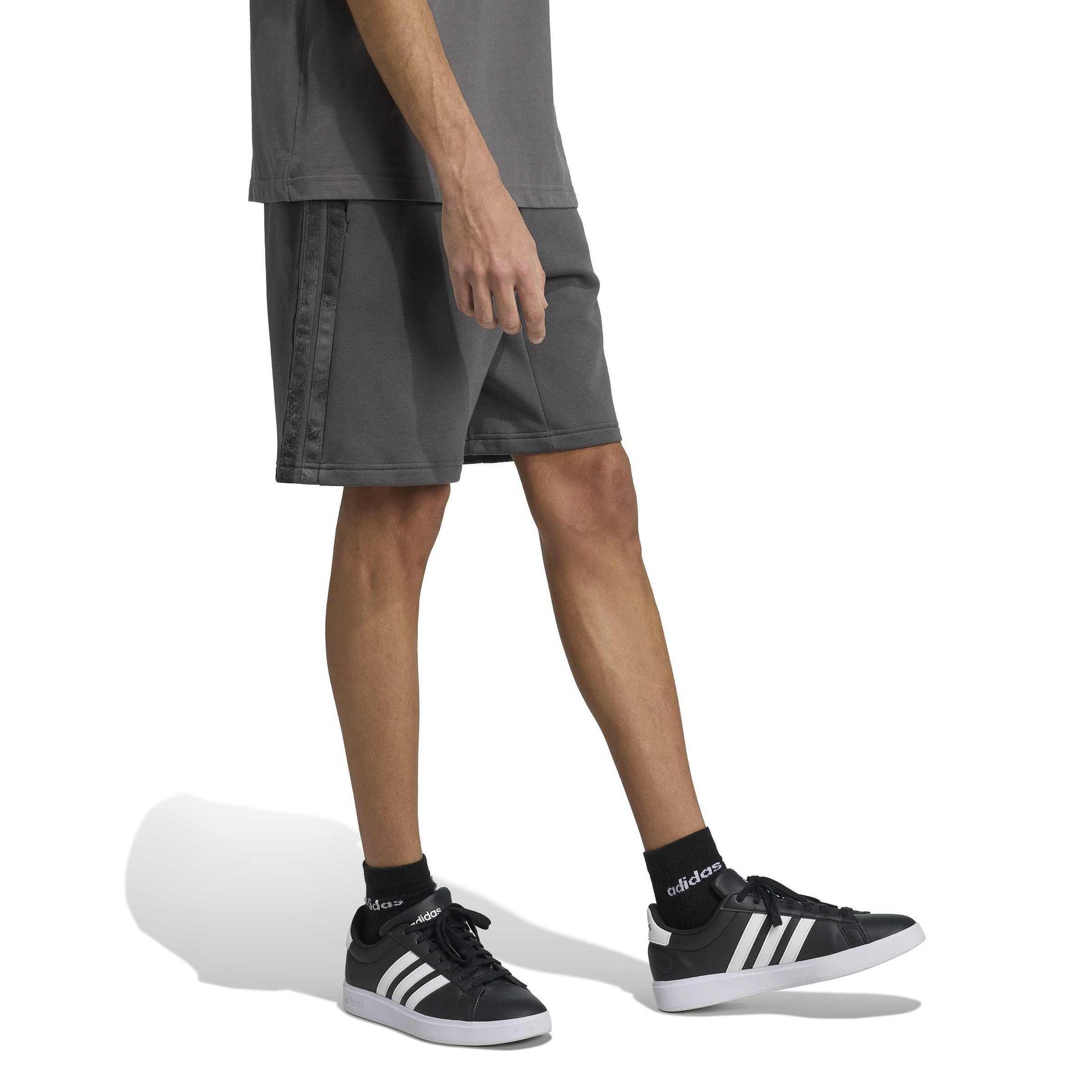 product/a/d/adidas_jm1719_4_apparel_on_model_walking_view_white.jpg